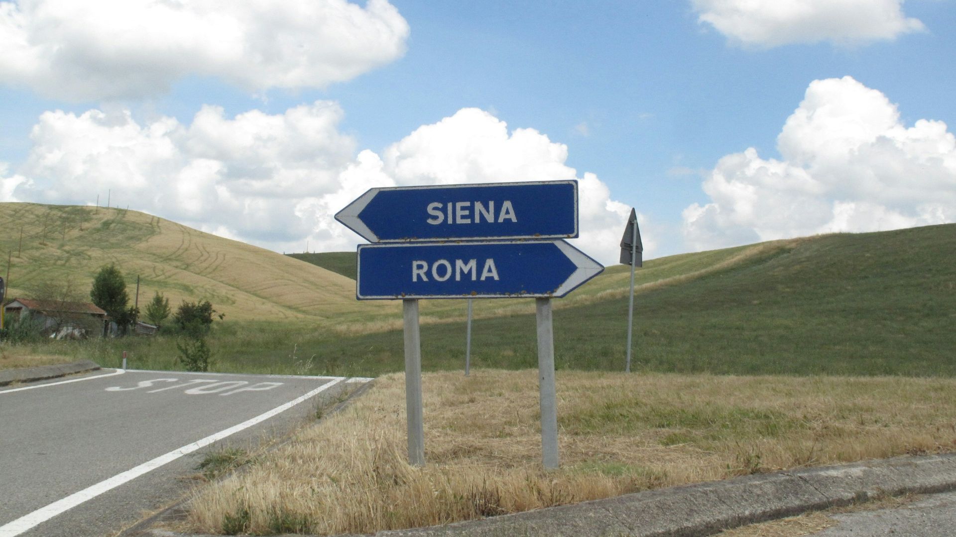 a sign on the side of the road