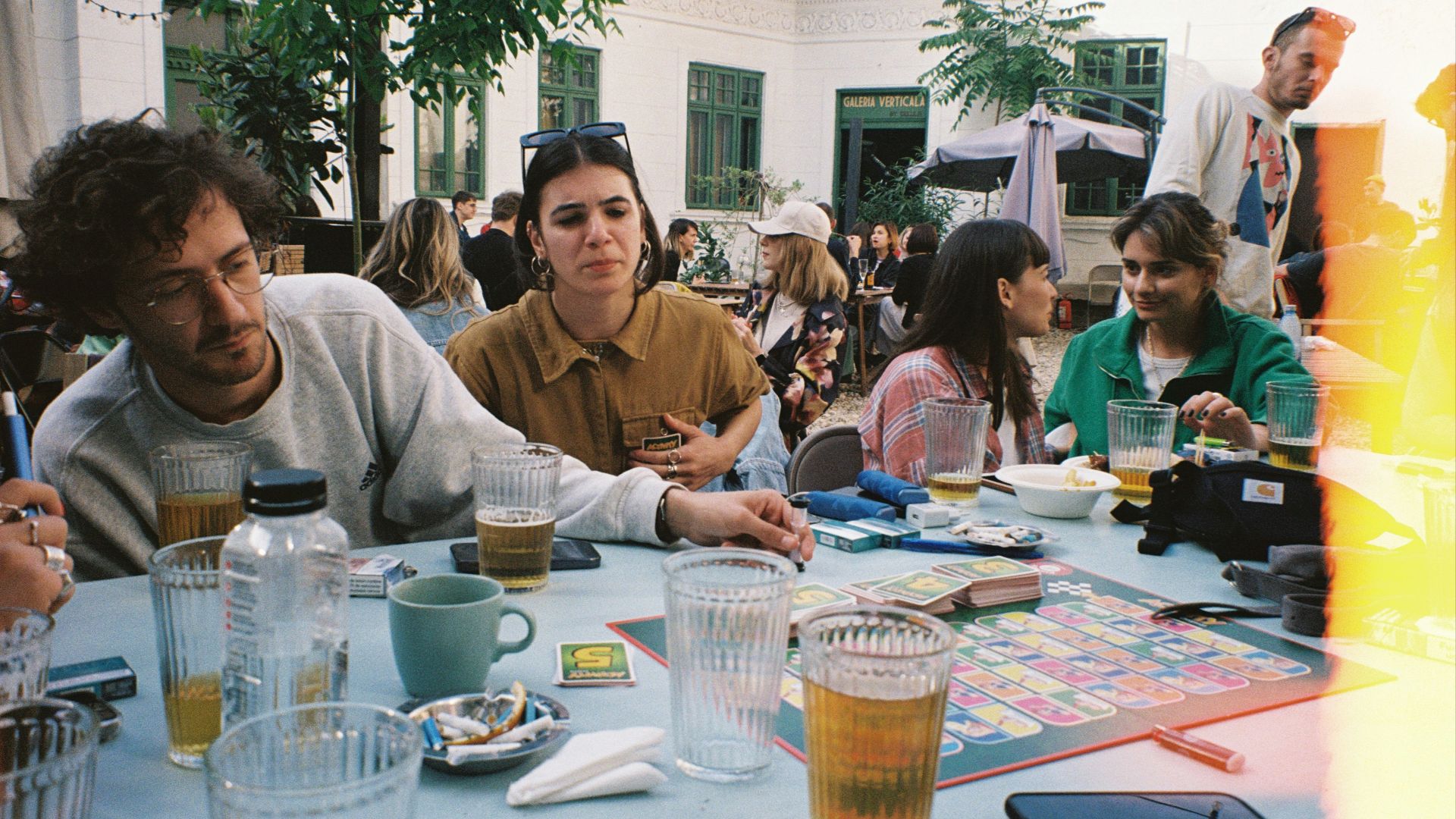 a group of people sitting around a table