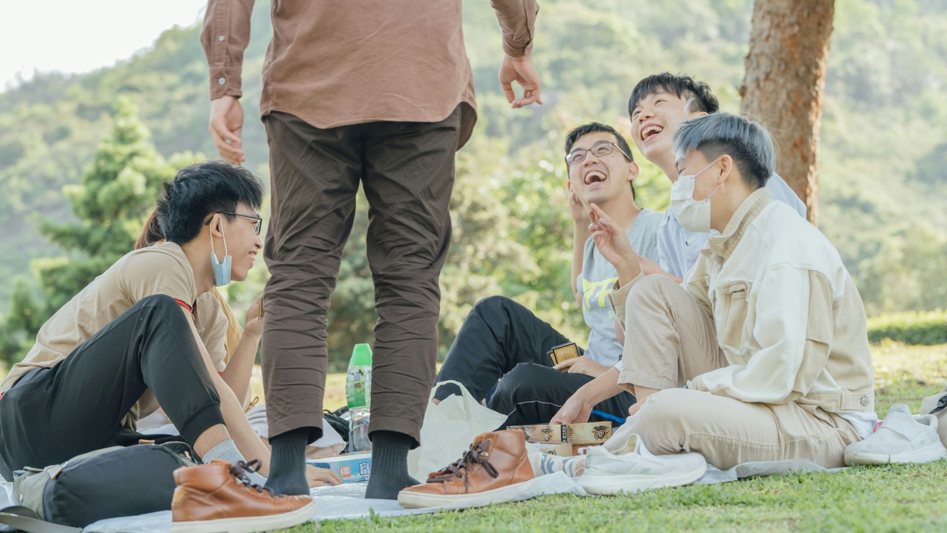 group of people doing yoga during daytime