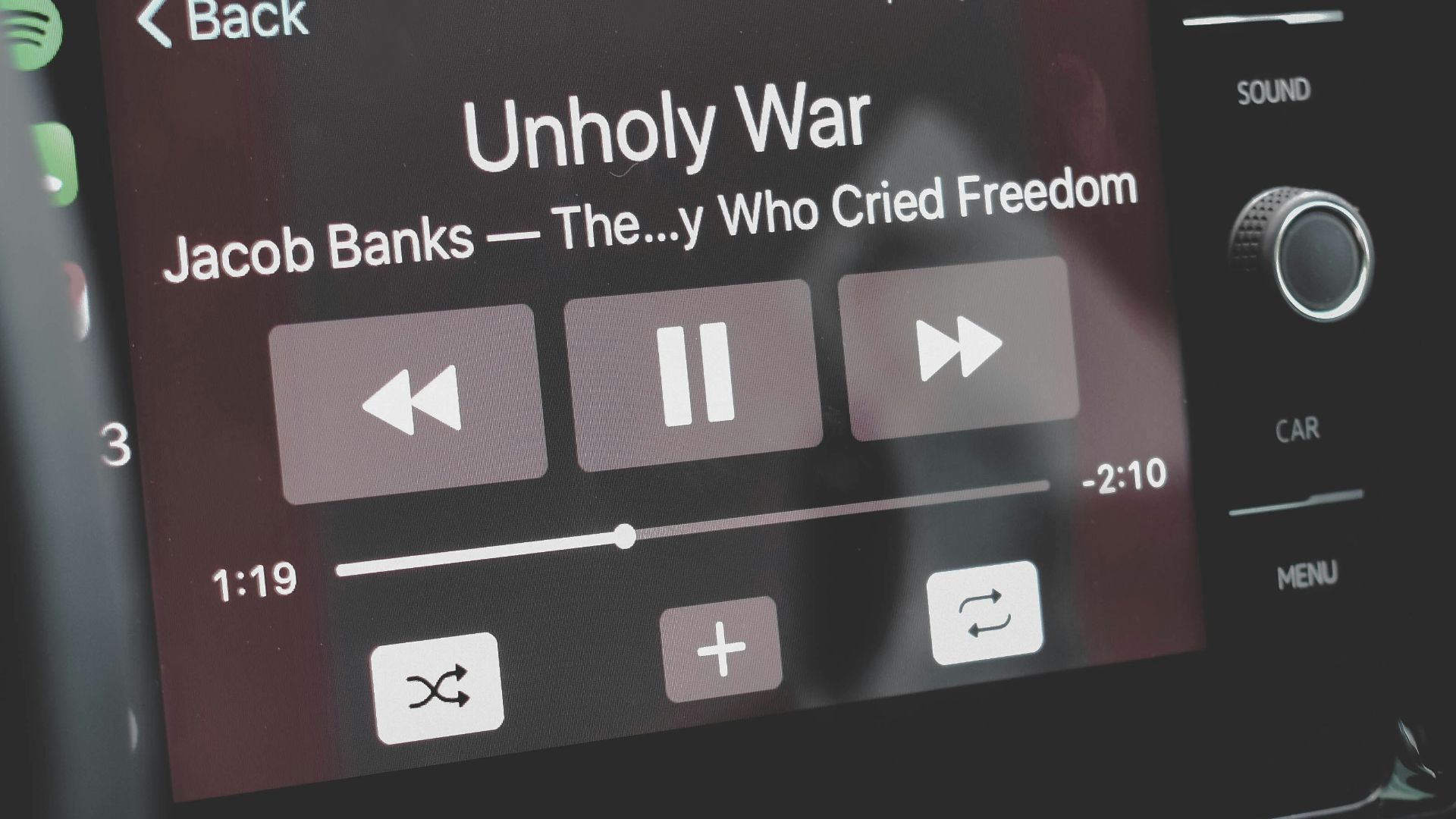 a car dashboard with an electronic device on it