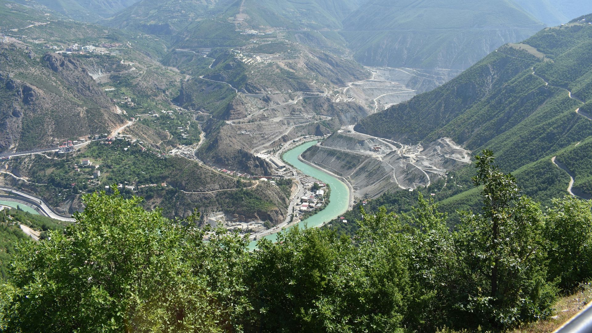 A scenic view of a valley and a river