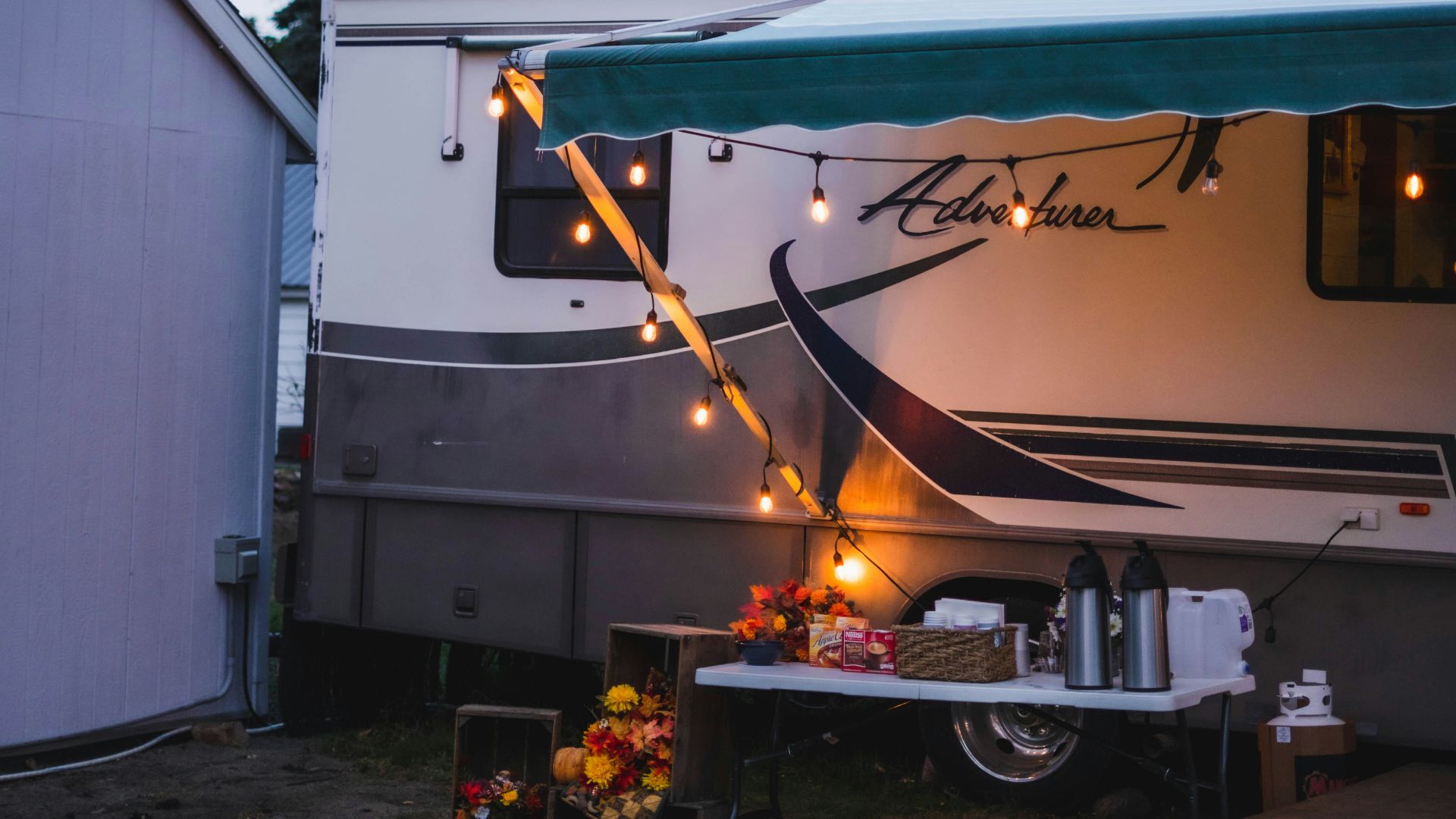 white and brown rv trailer