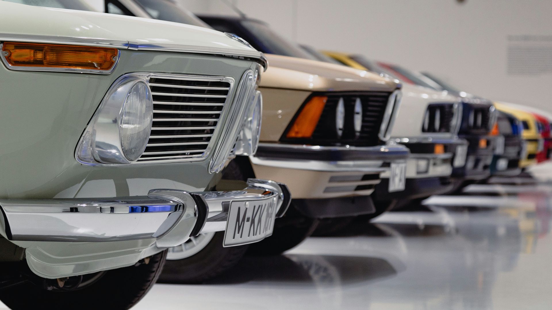 selective focus photography of assorted-color vehicles