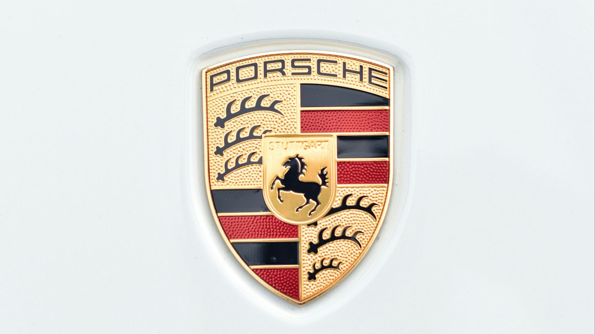a porsche emblem on a white background