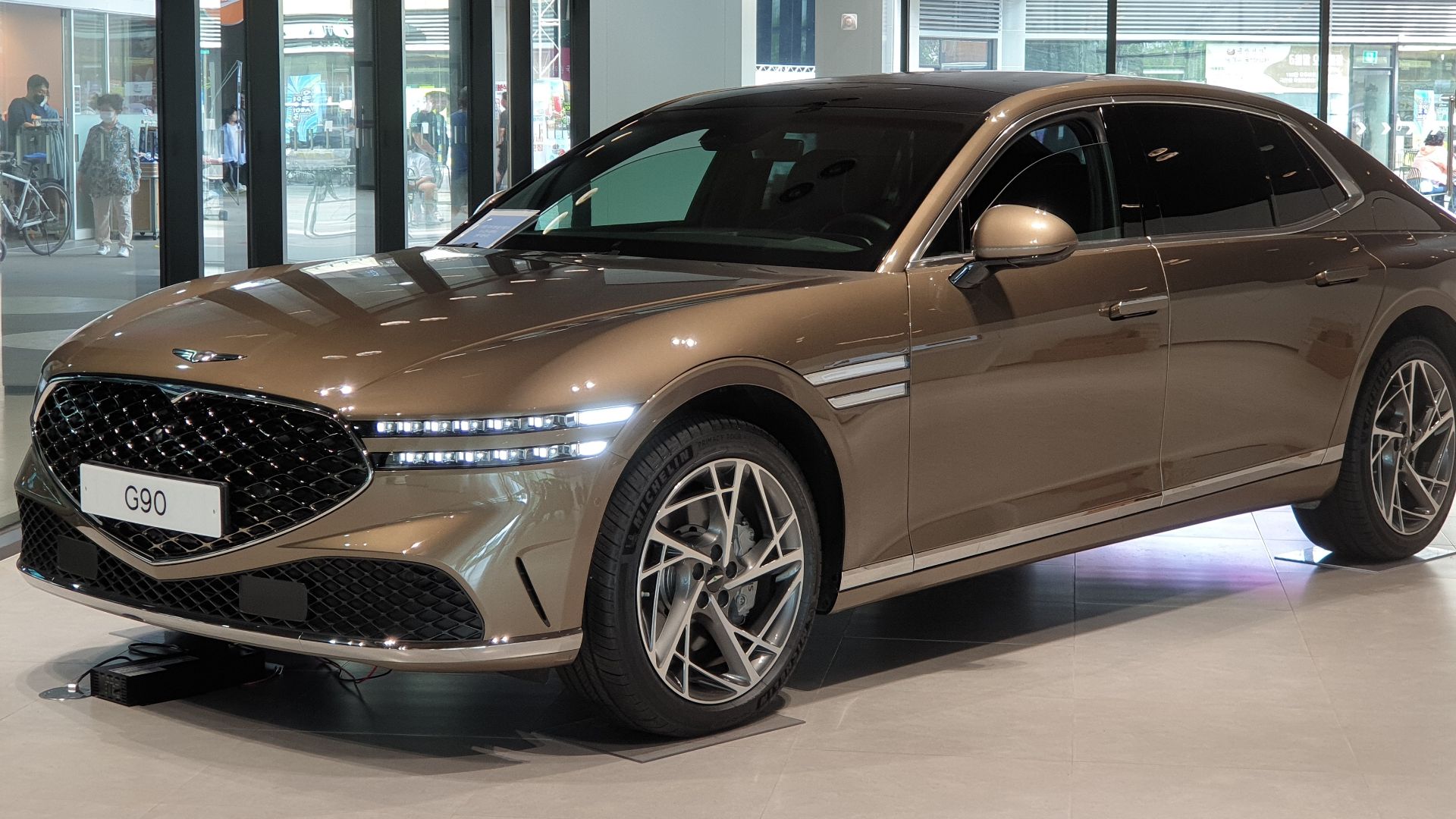 File:Genesis G90 RS4 3.5T AWD Valencia Gold (14) (cropped).jpg