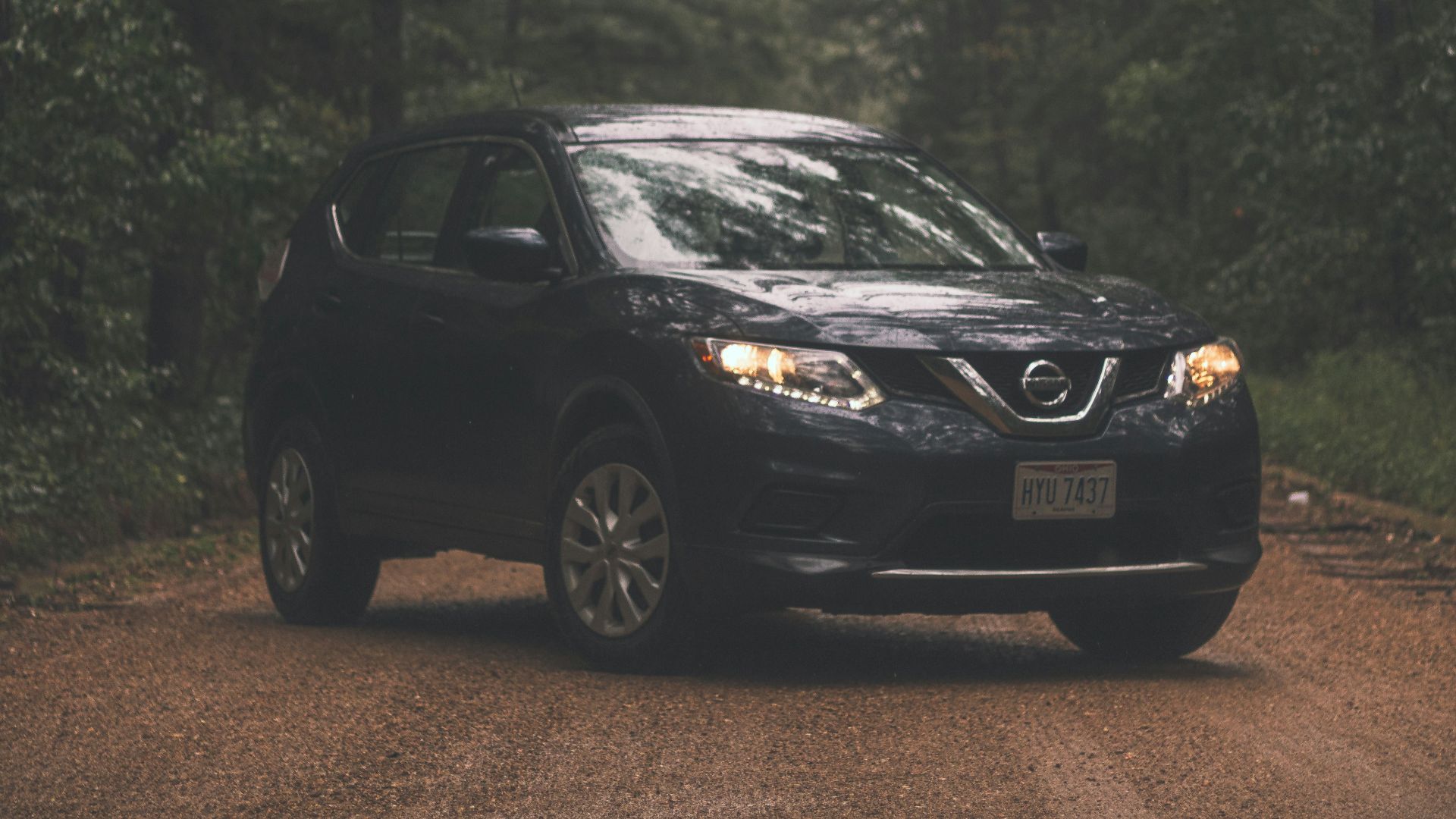 black honda sedan on road during daytime