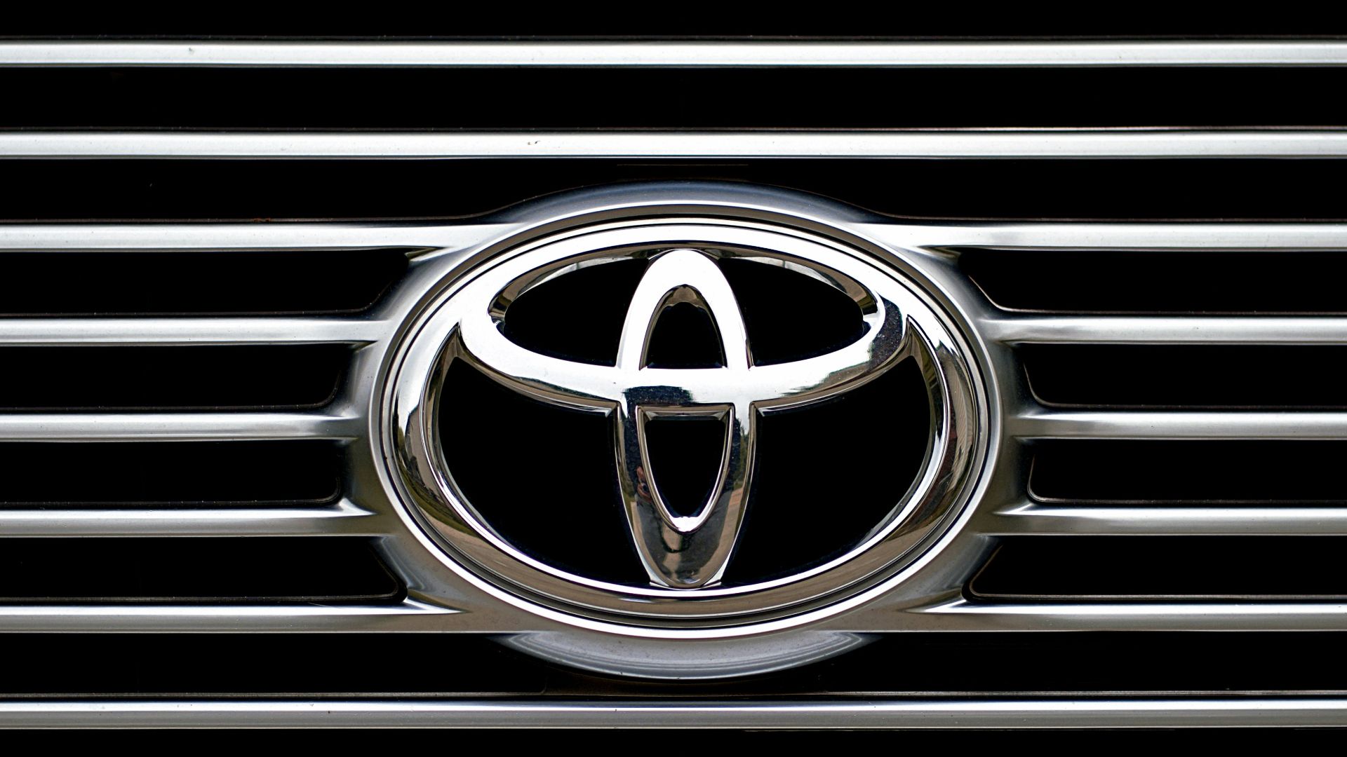 The image shows a toyota grill and logo.