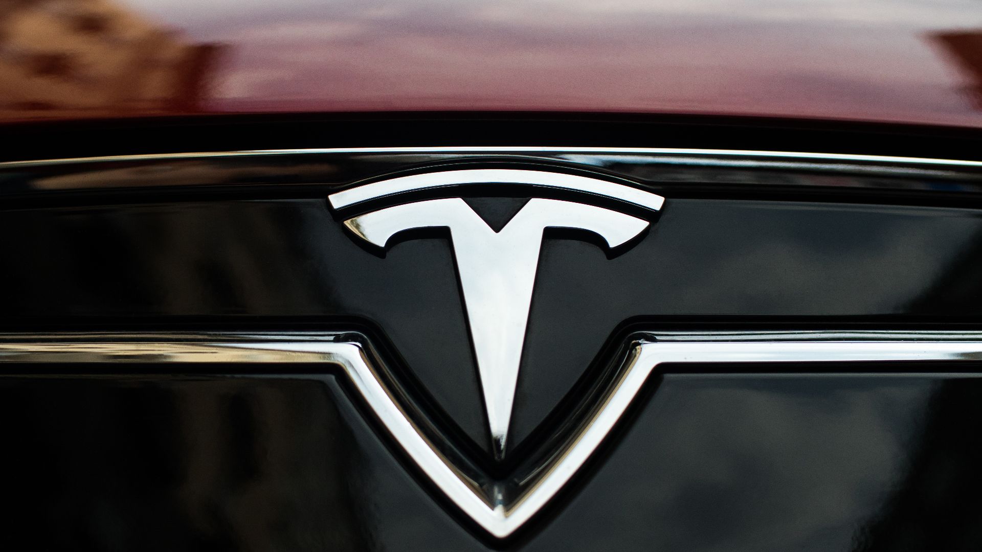 File:TESLA badge on a car.jpg