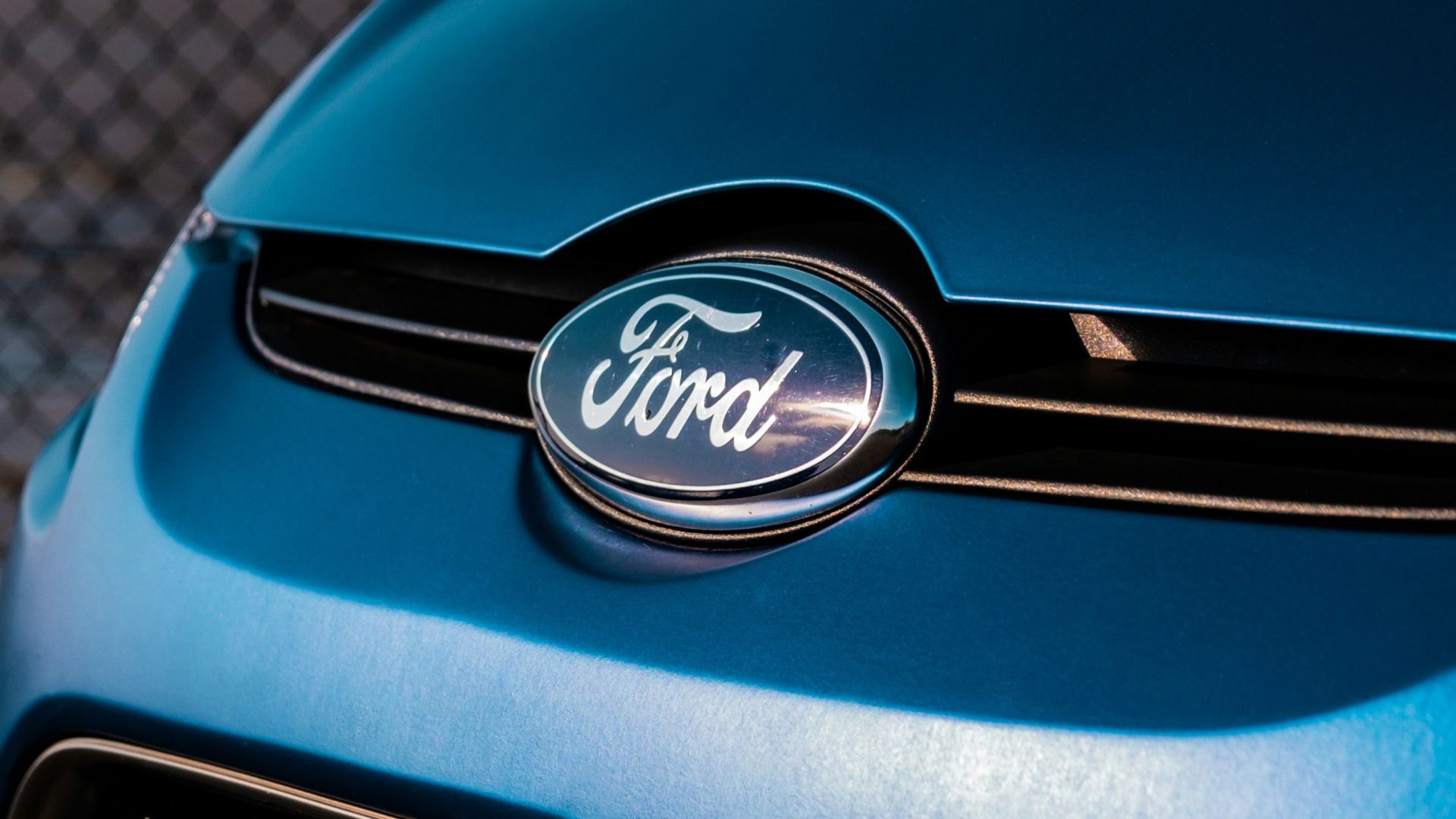 blue and silver nissan car