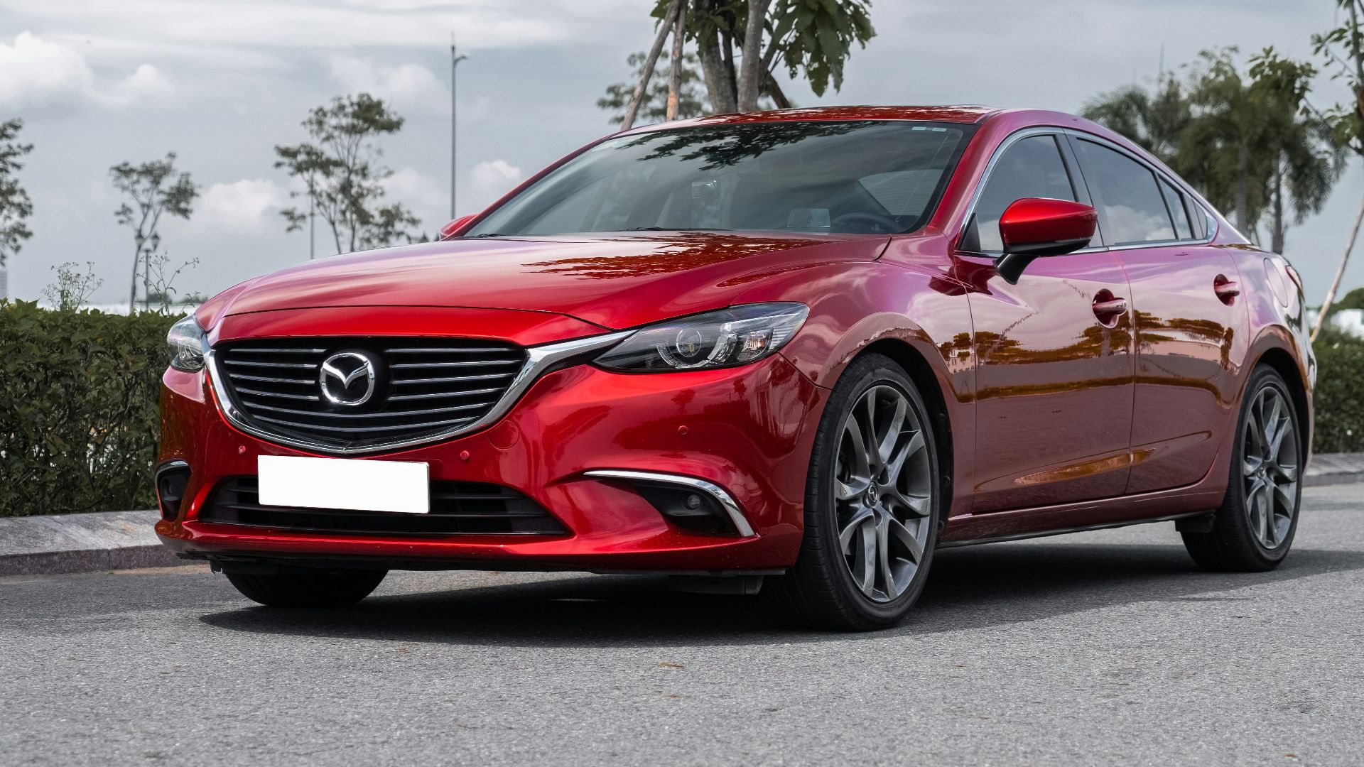 a red car parked on a street