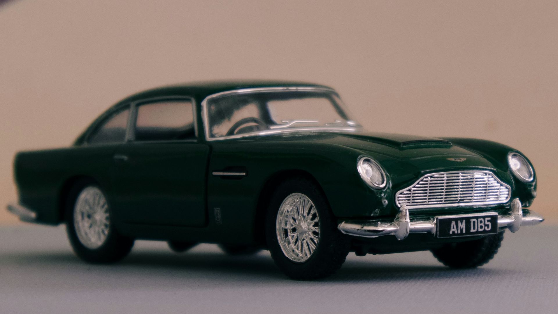 a toy car is sitting on a table