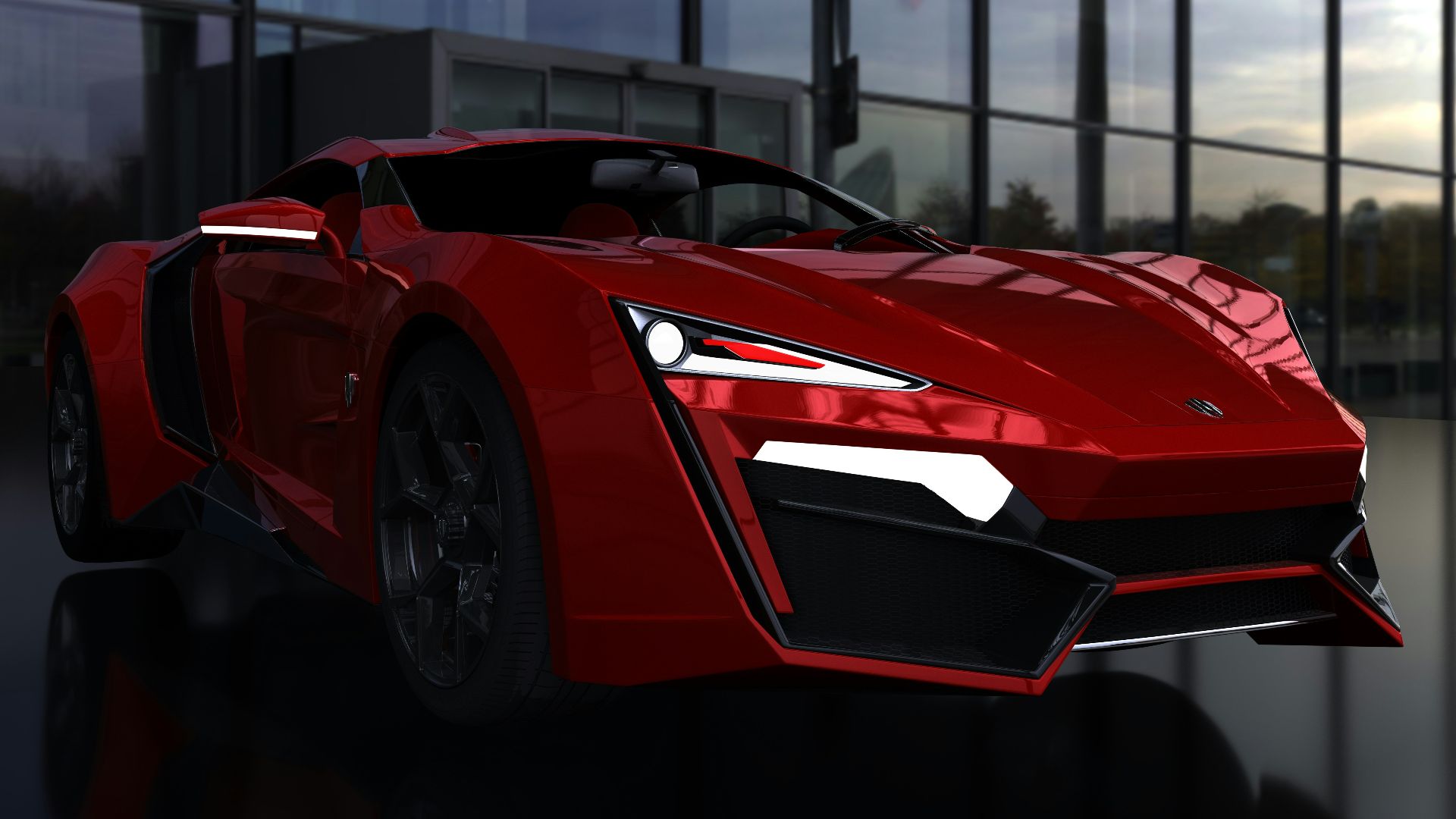 a red sports car parked in front of a building