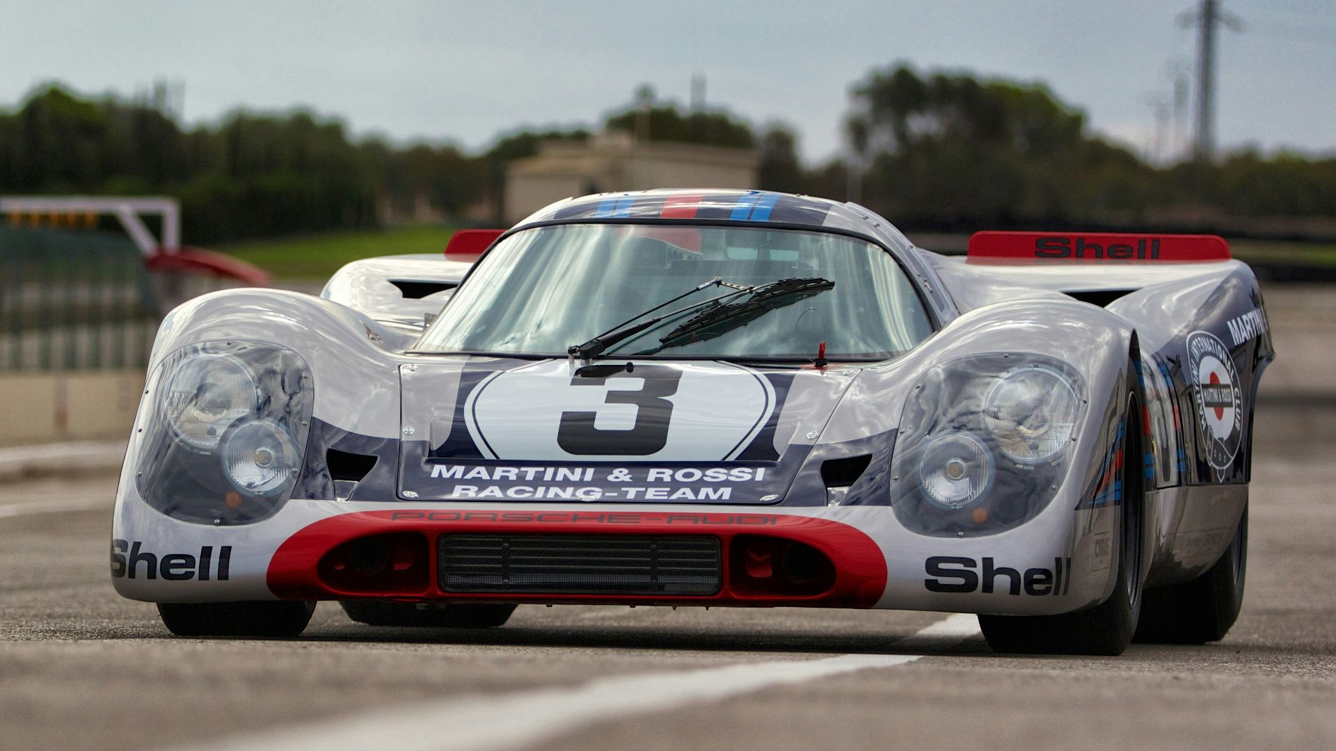shallow focus photo of white race car