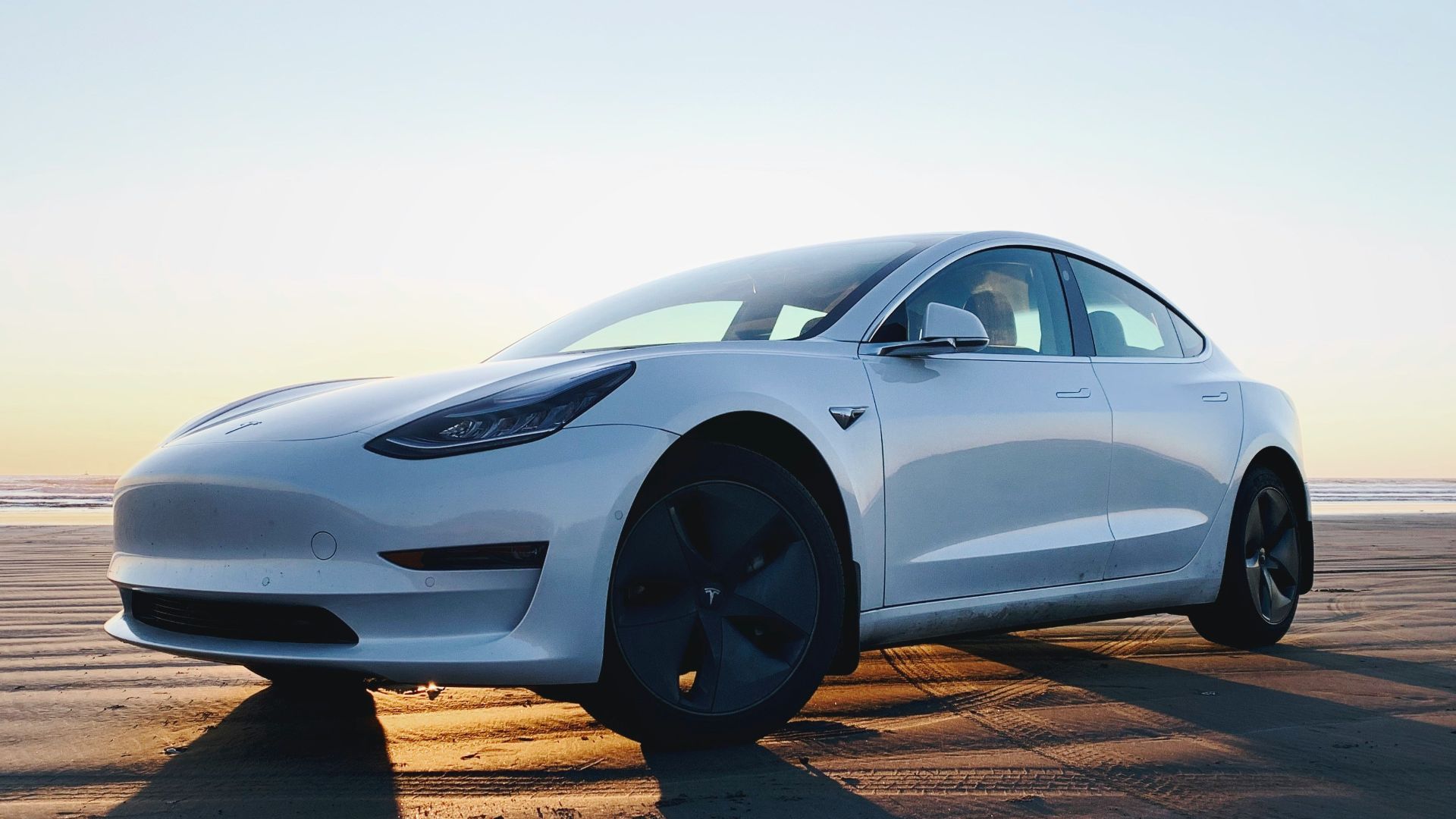 white bmw m 3 coupe on road during daytime