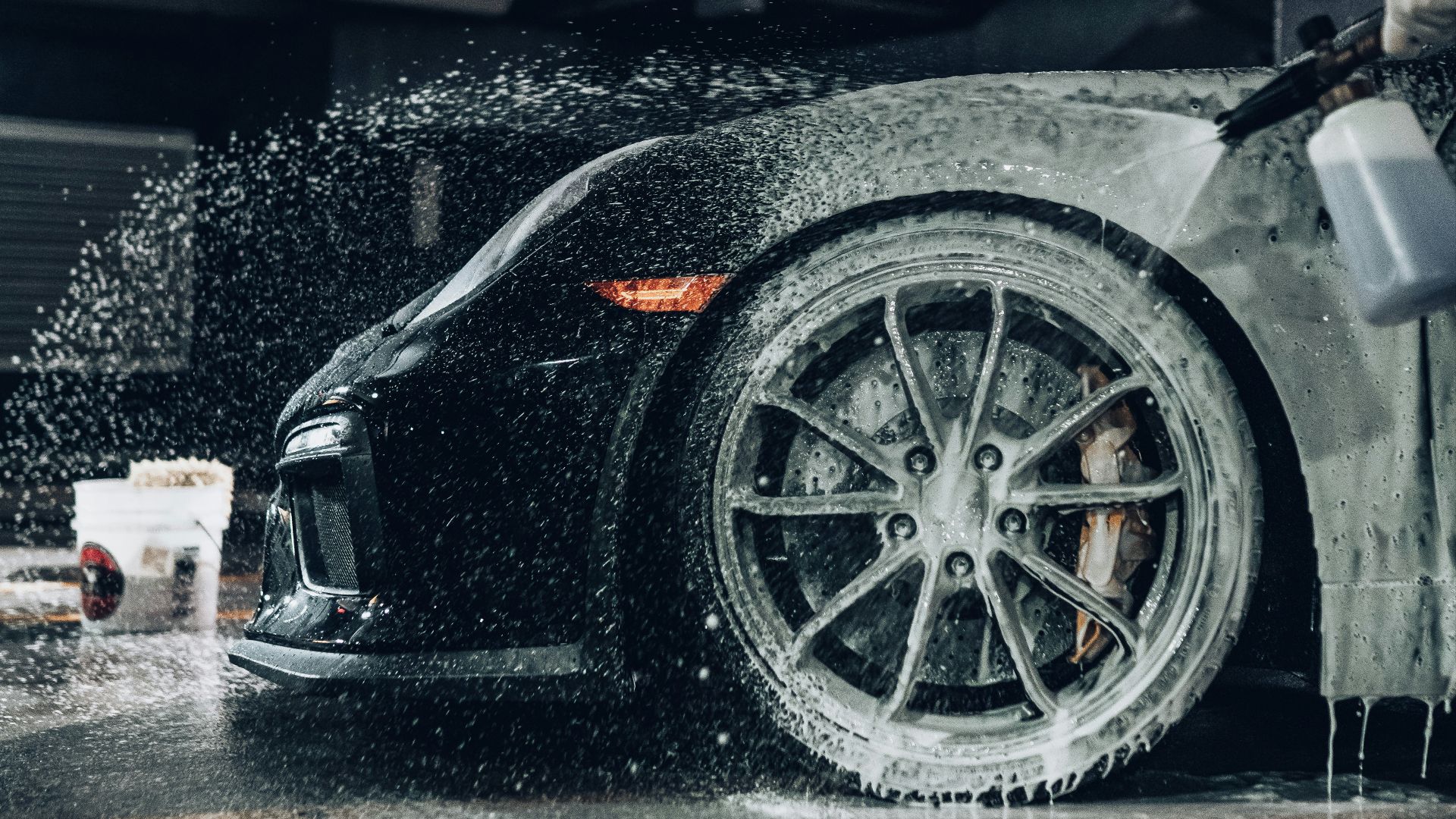 black car with white plastic cup on top