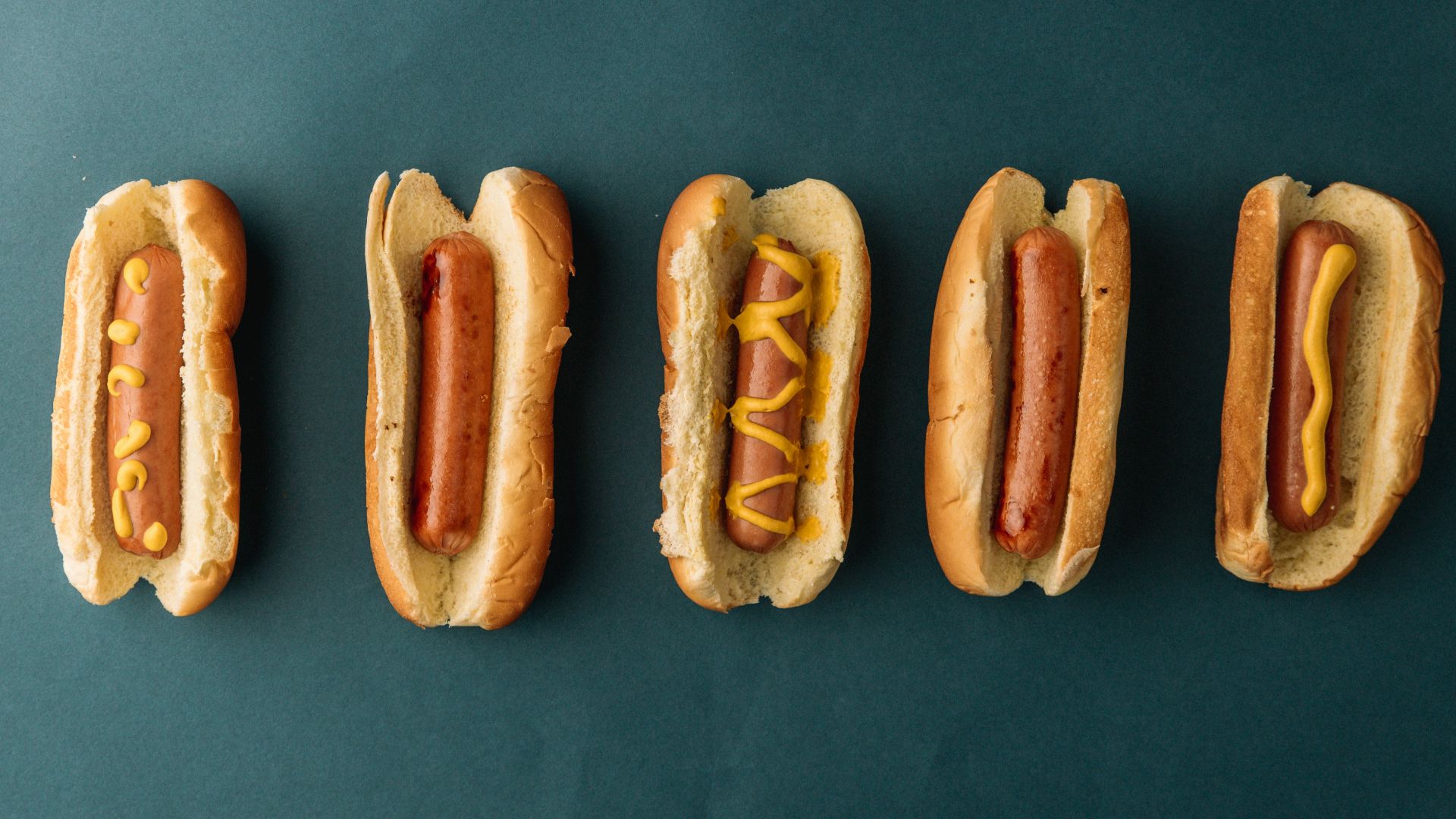 two brown bread on blue textile