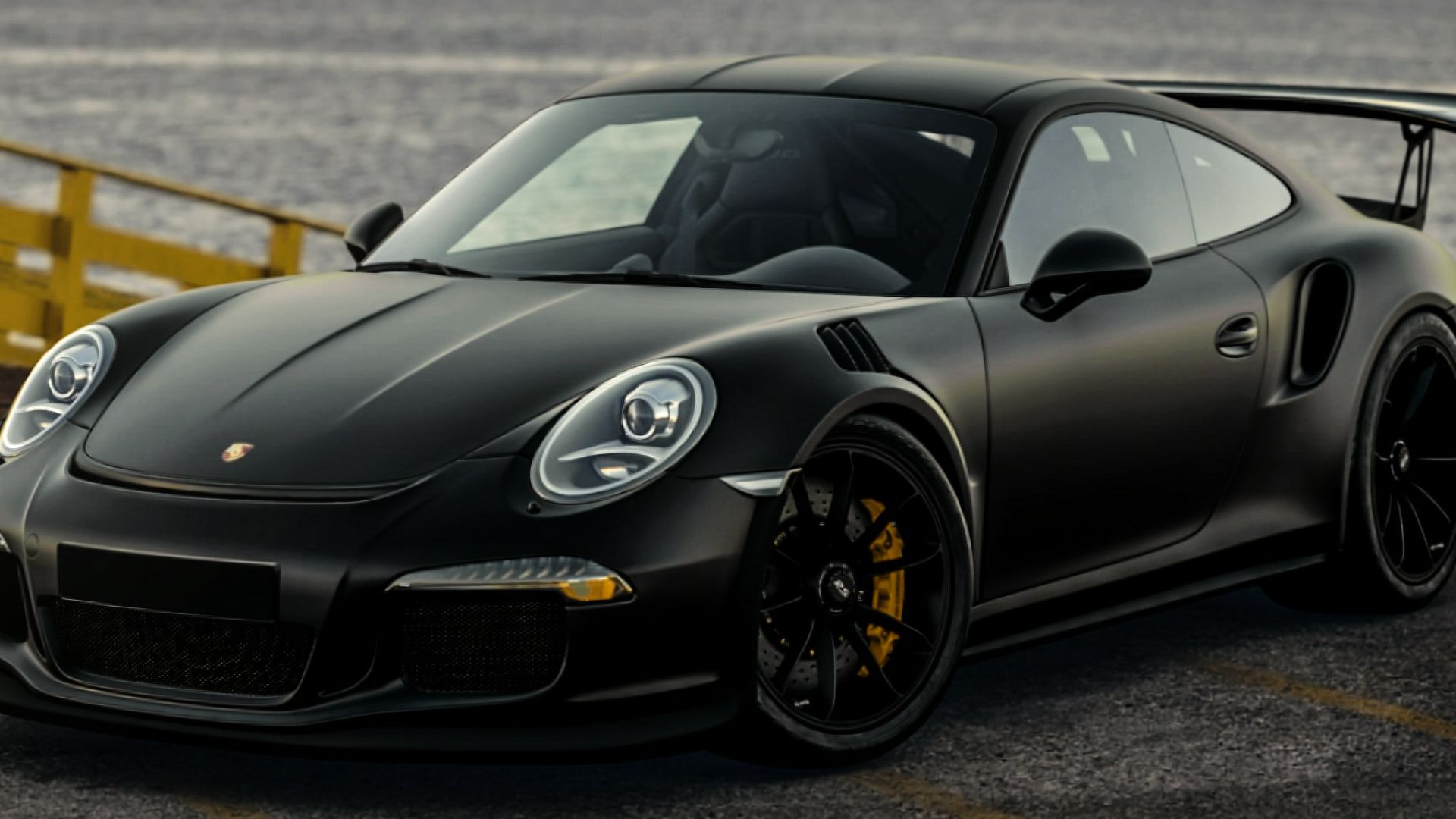 black porsche 911 on road during daytime