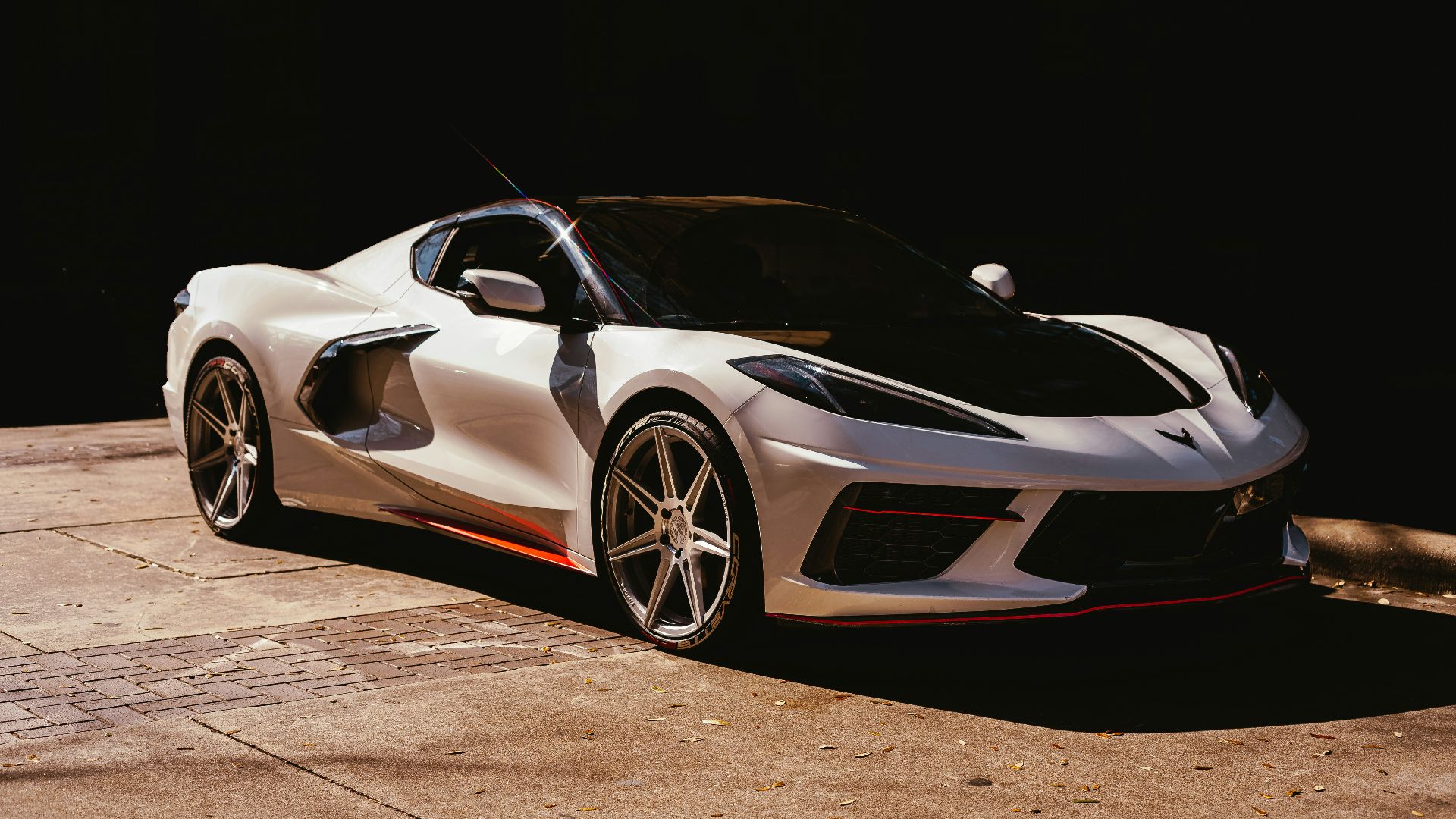 black lamborghini aventador on black background