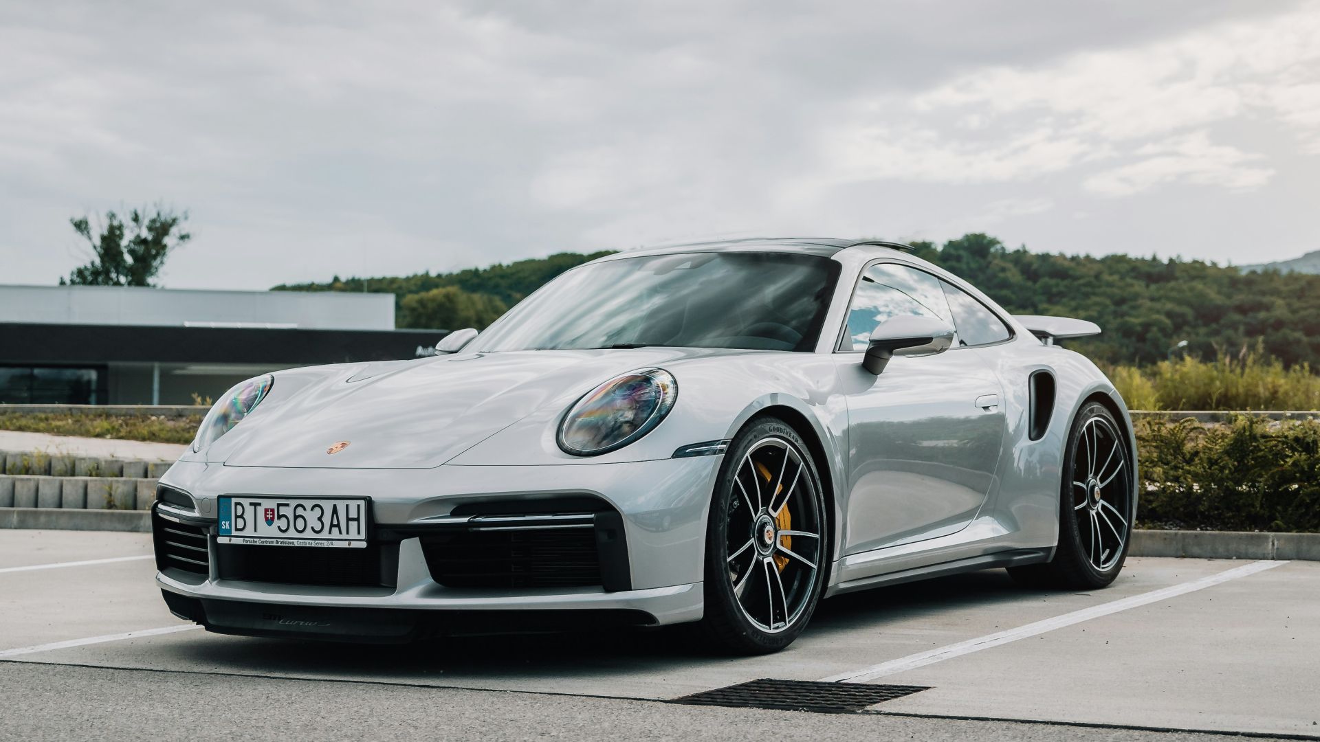 silver mercedes benz coupe on road during daytime