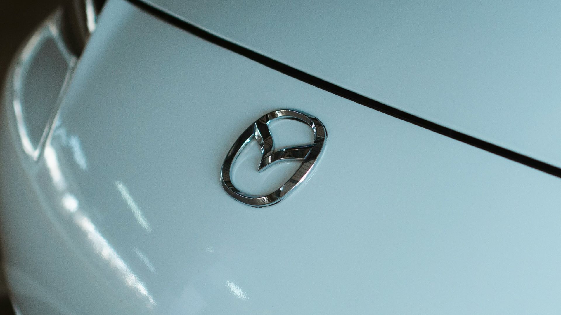 a close up of the emblem on a car
