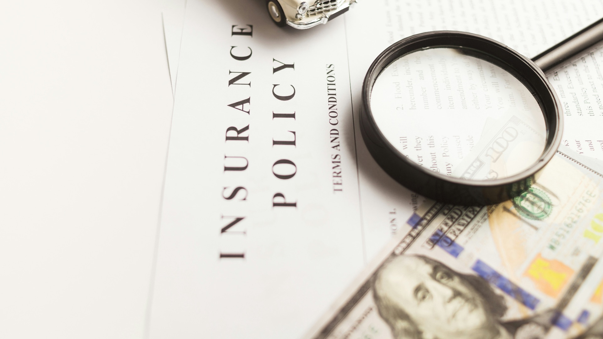 a magnifying glass sitting on top of a piece of paper