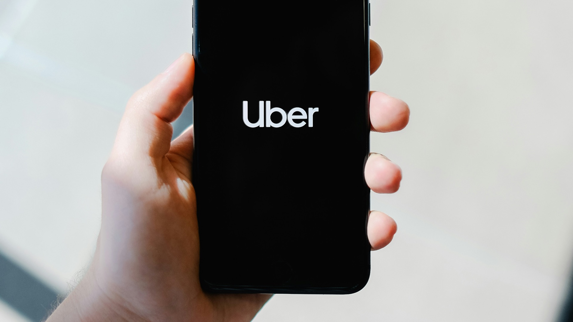 person holding black iphone 5