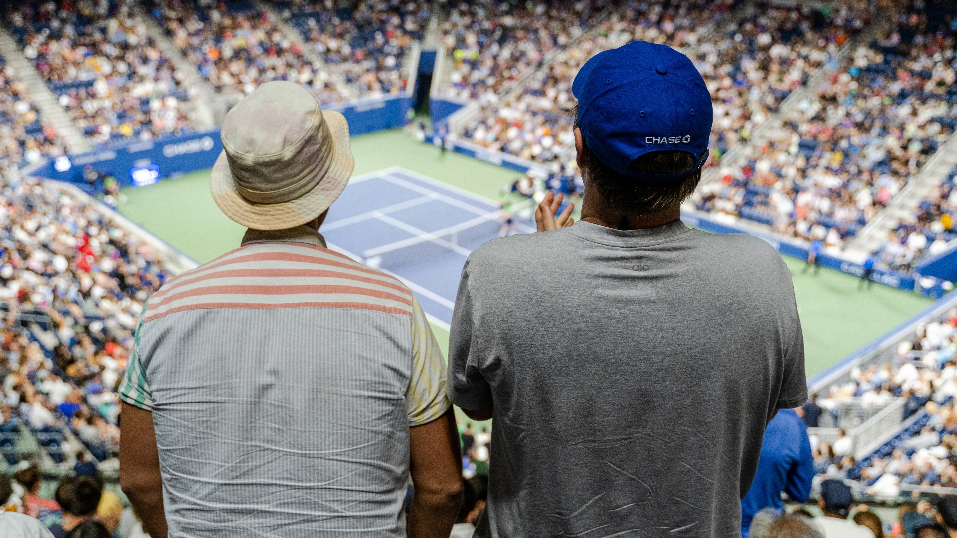 a couple of men in a stadium