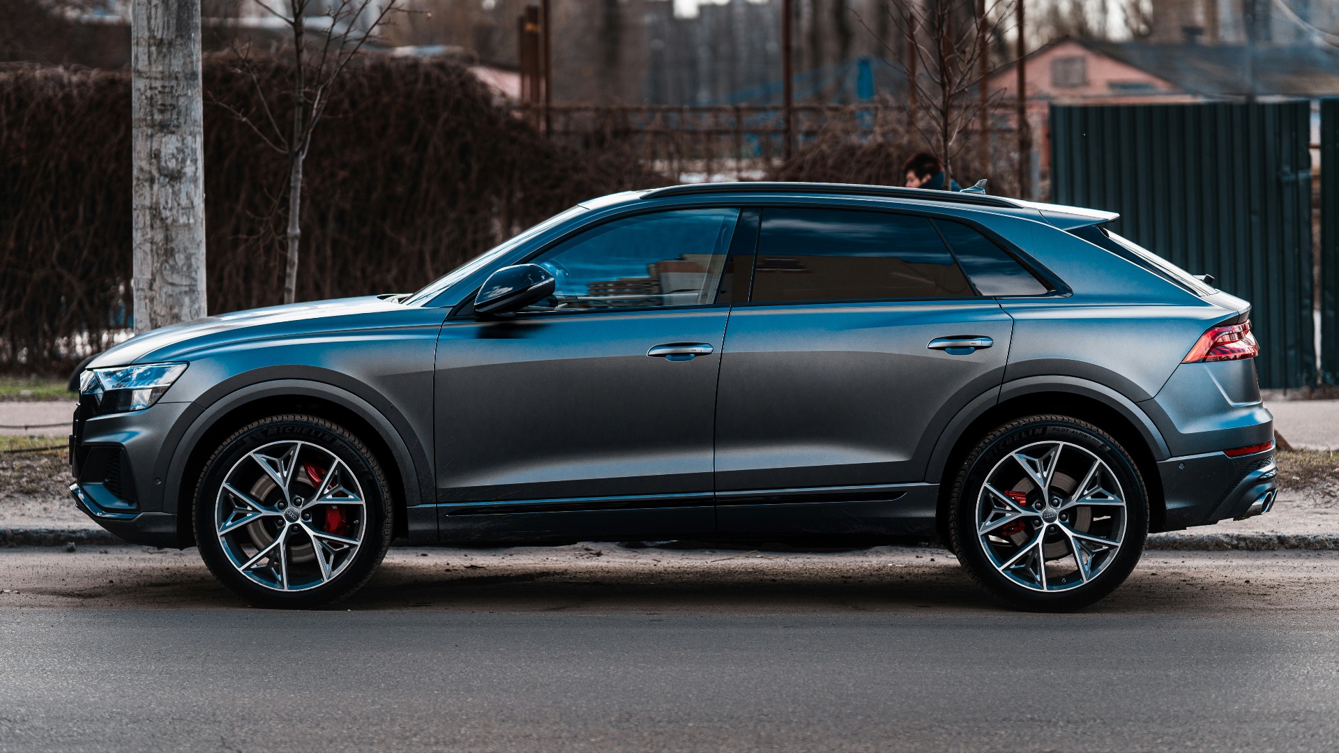 black sedan on road during daytime
