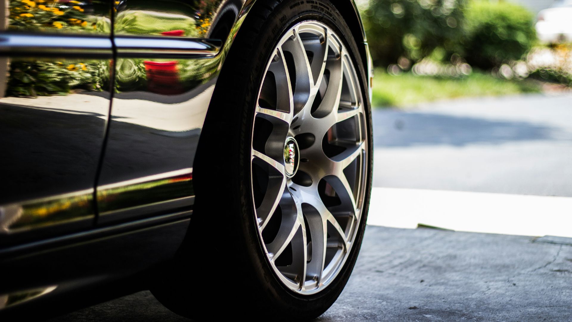 gray vehicle rim with tire