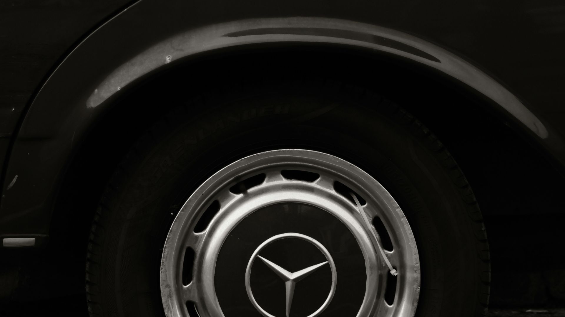 Close-up of a vintage mercedes-benz car wheel
