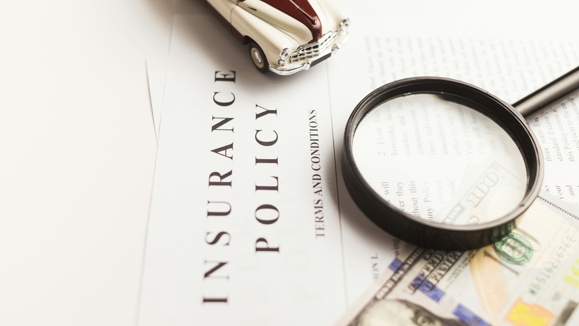 a magnifying glass sitting on top of a piece of paper