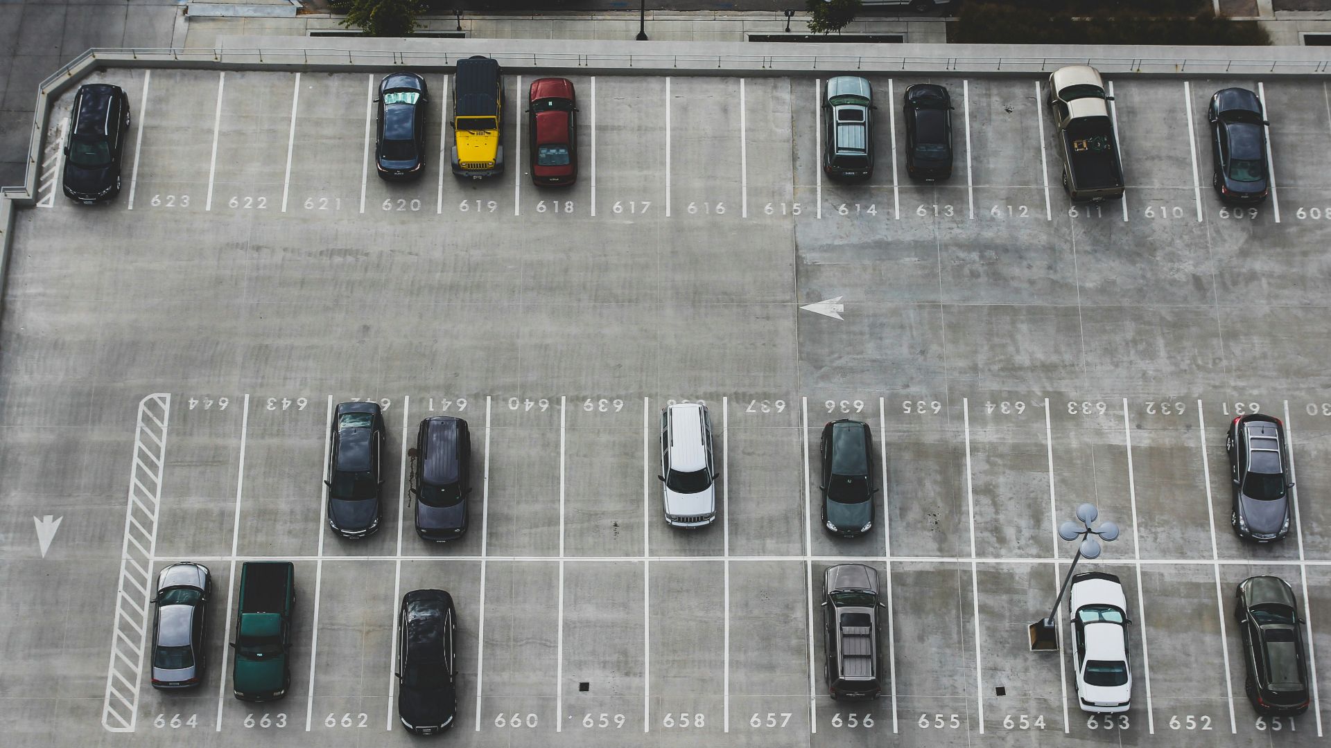 aerial view of cars parked on parking lot