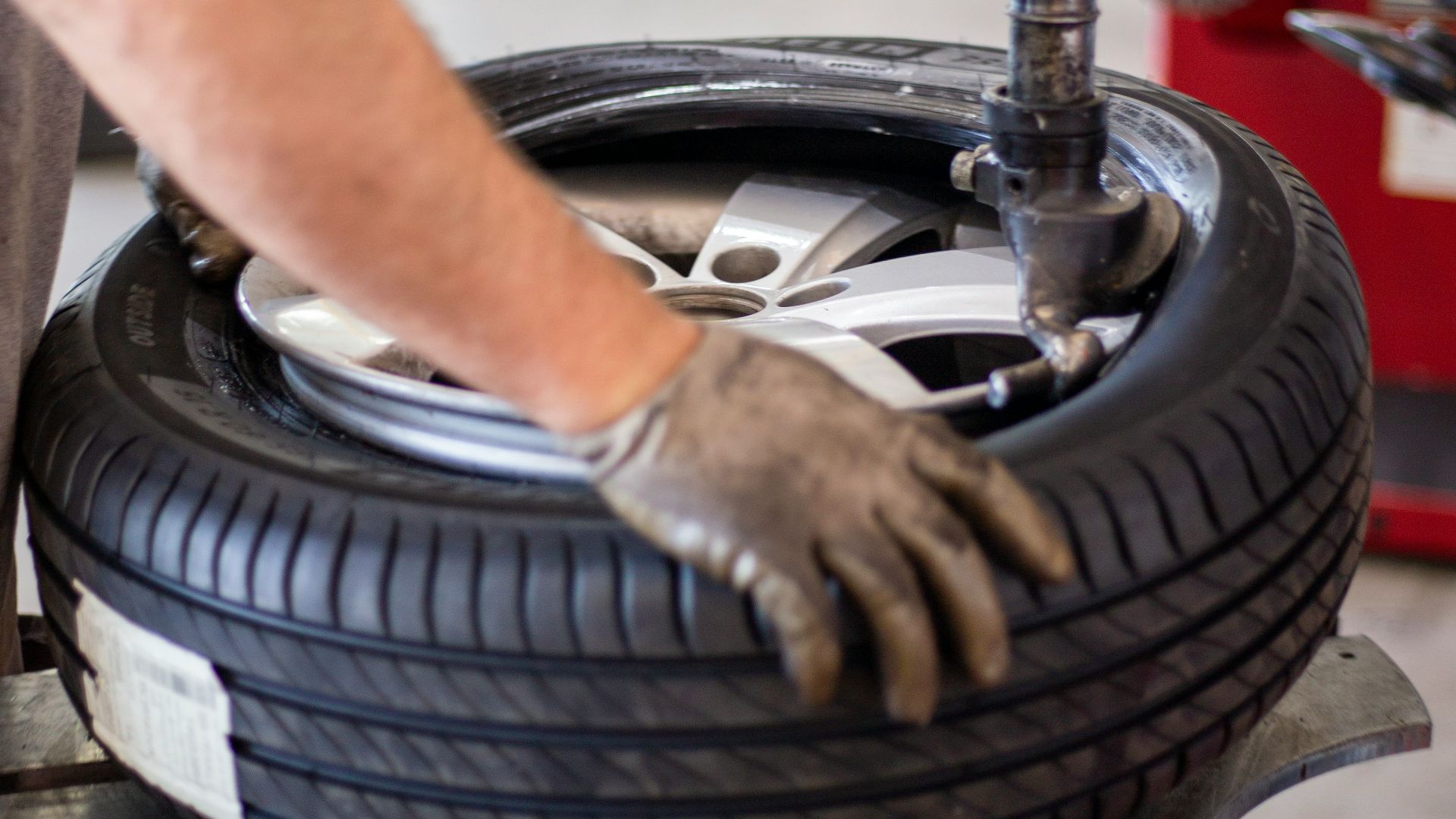 person holding black and gray metal tool