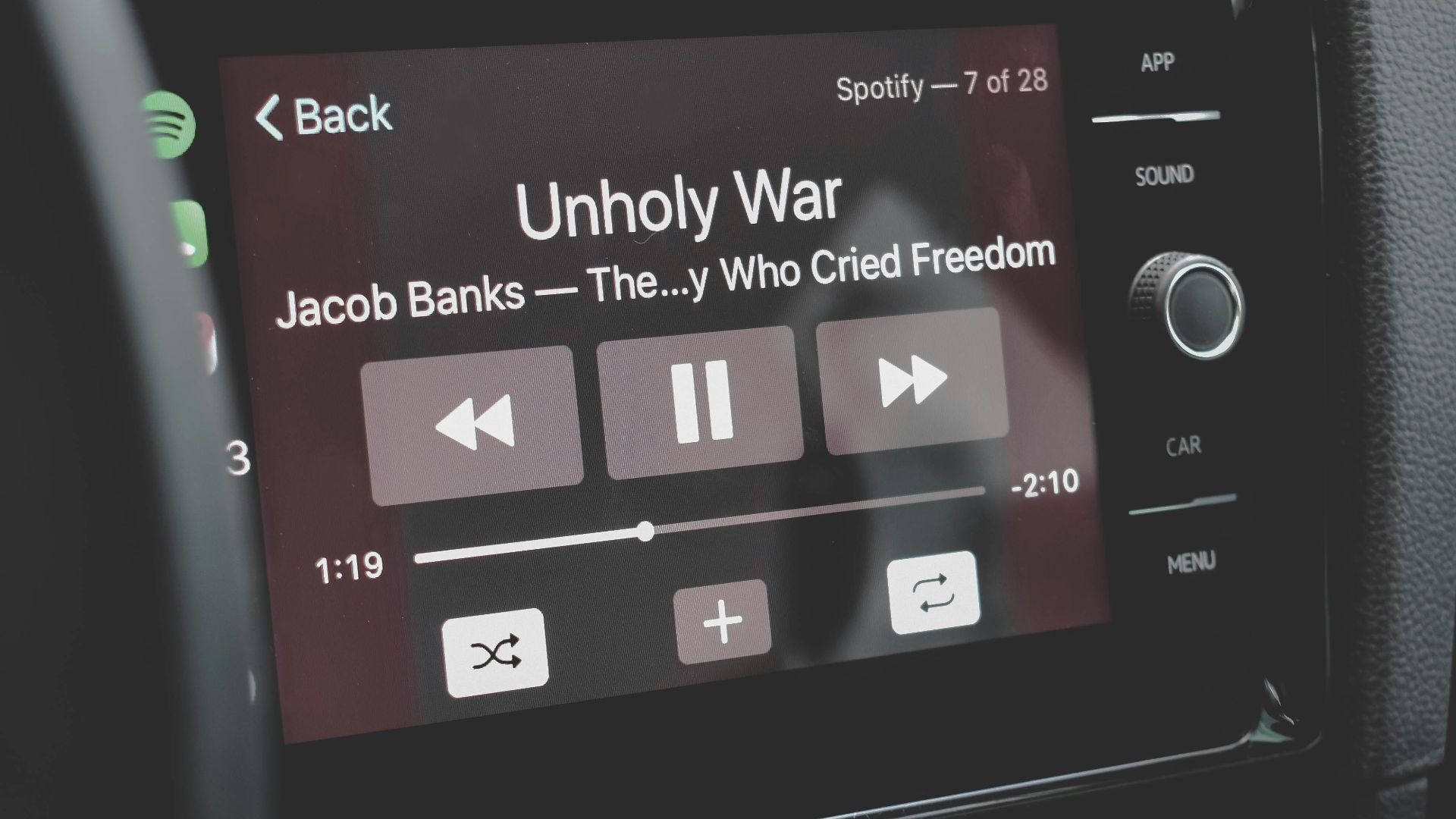 a car dashboard with an electronic device on it