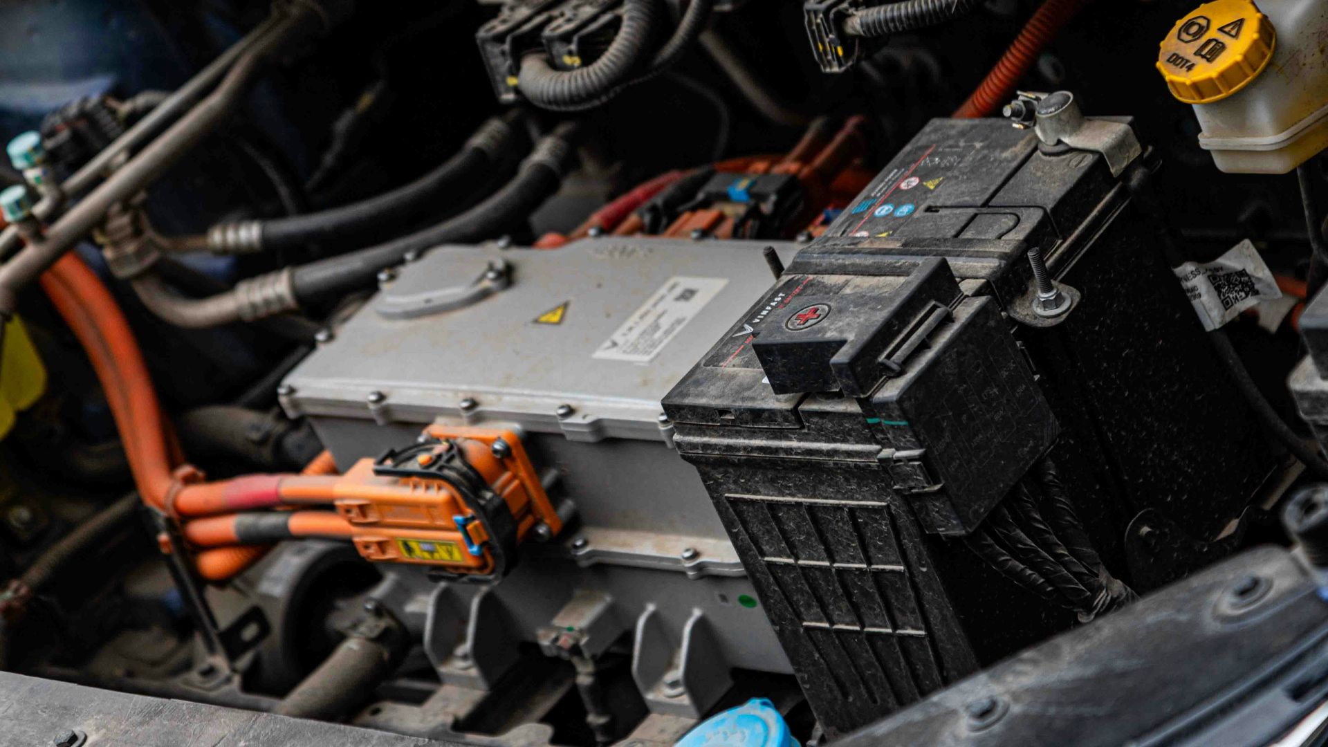 Electric car engine with visible wiring and battery components