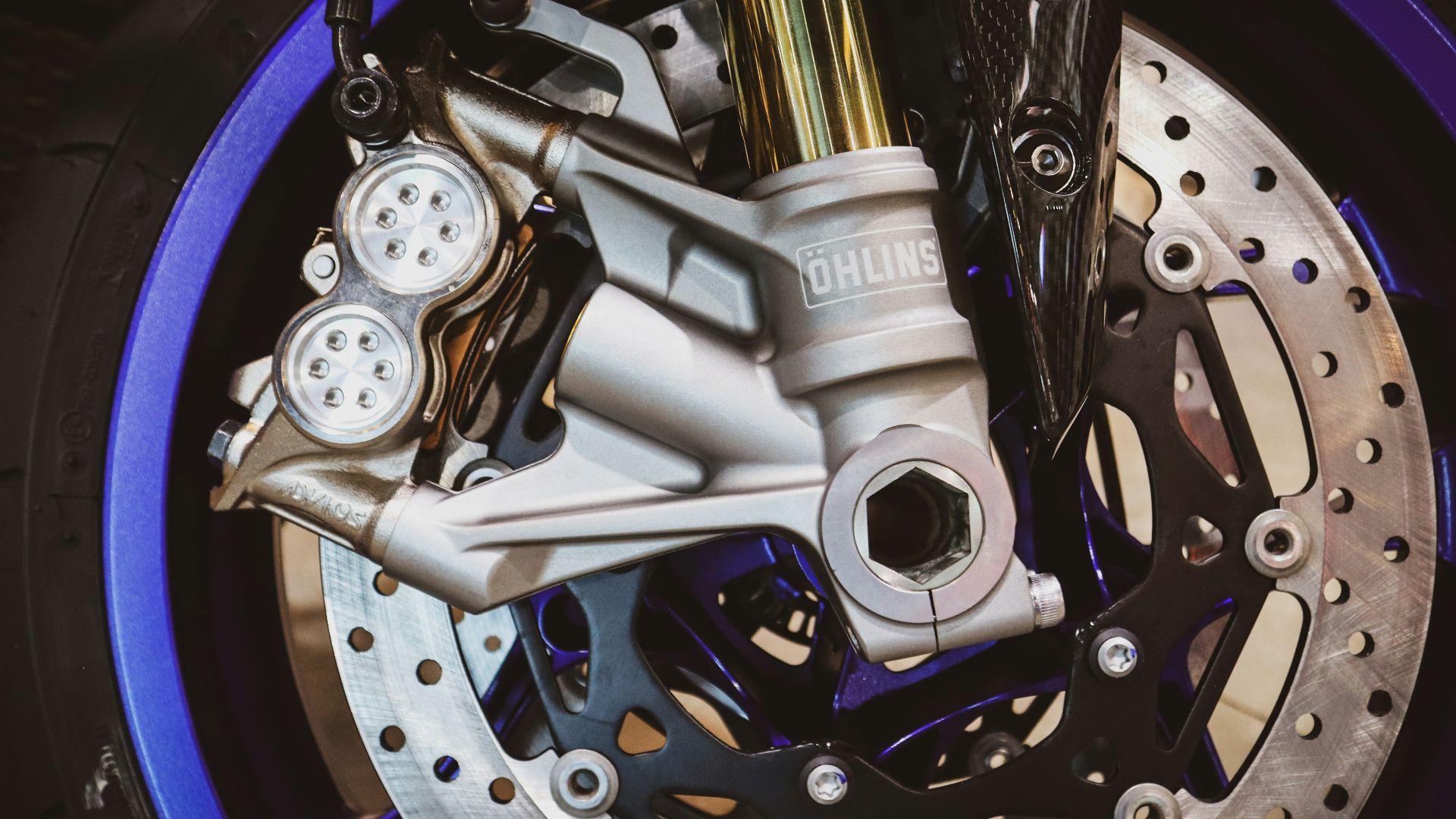 Close-up of a motorcycle's front brake system.