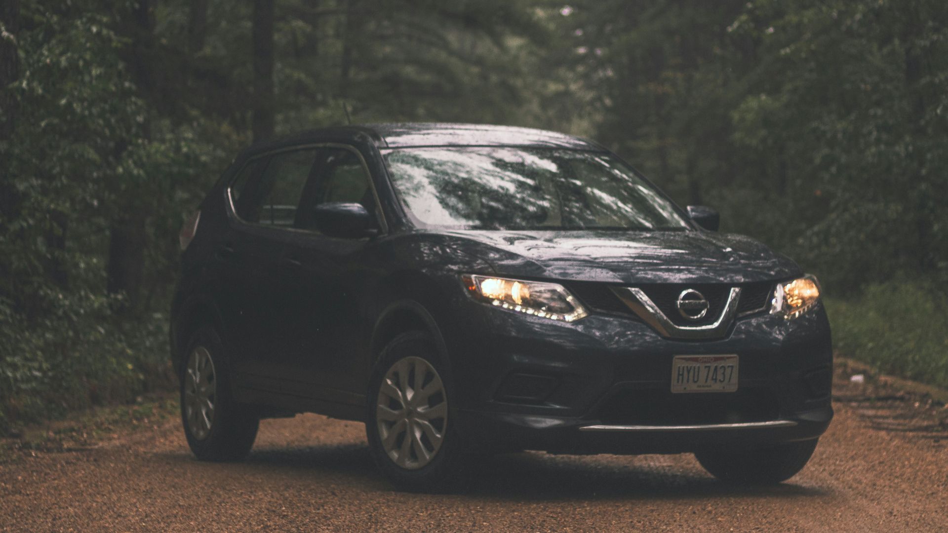 black honda sedan on road during daytime
