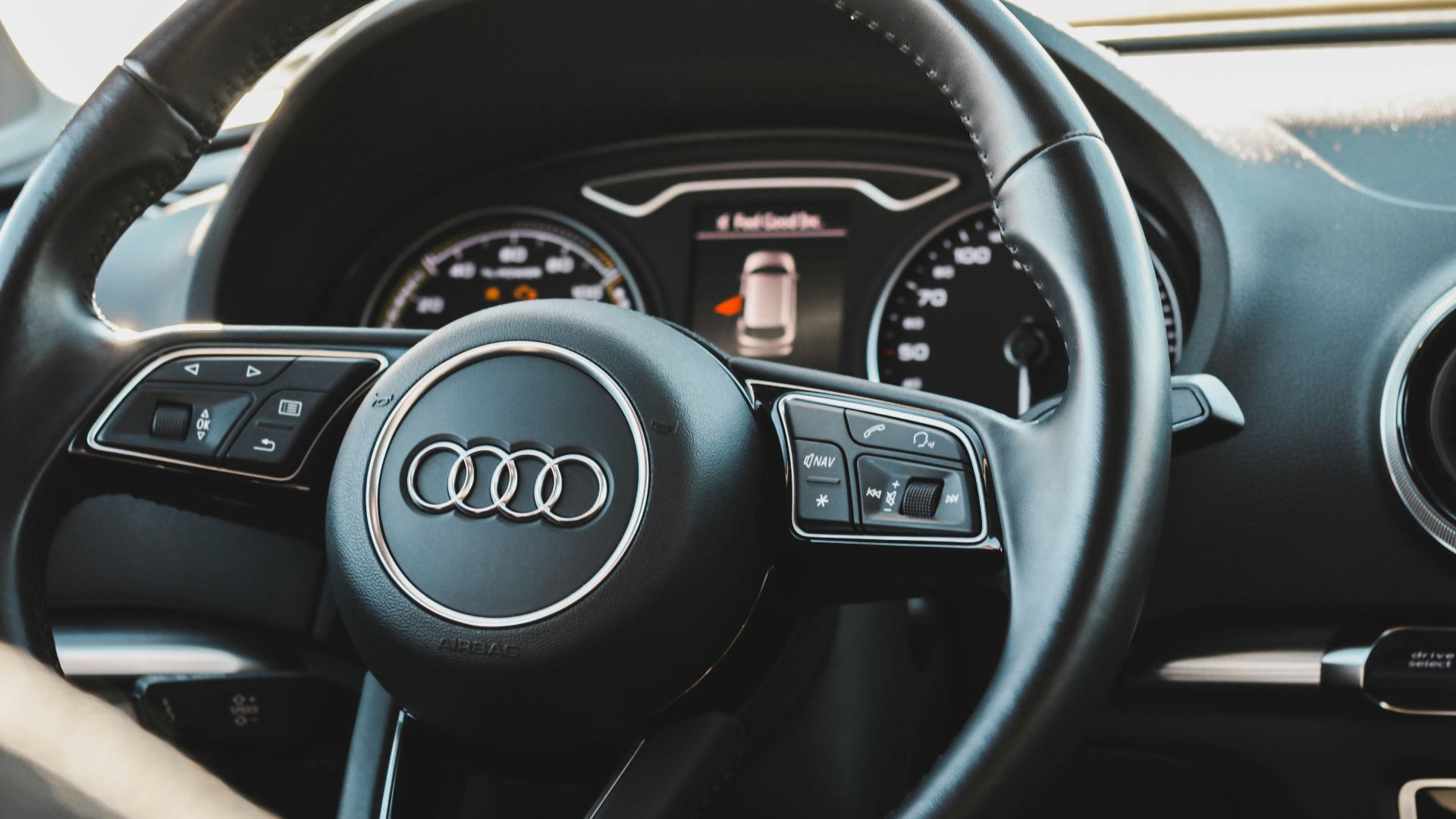 black audi car steering wheel
