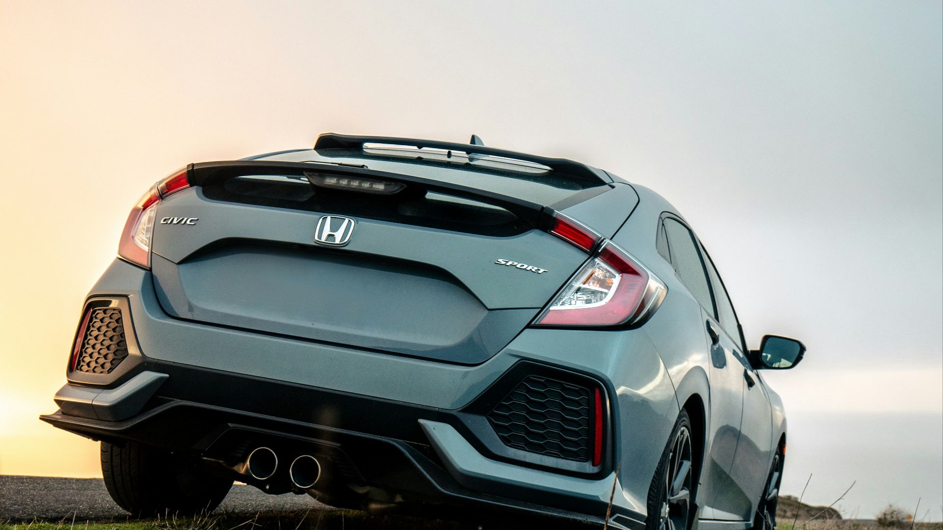 black bmw m 3 on green grass field