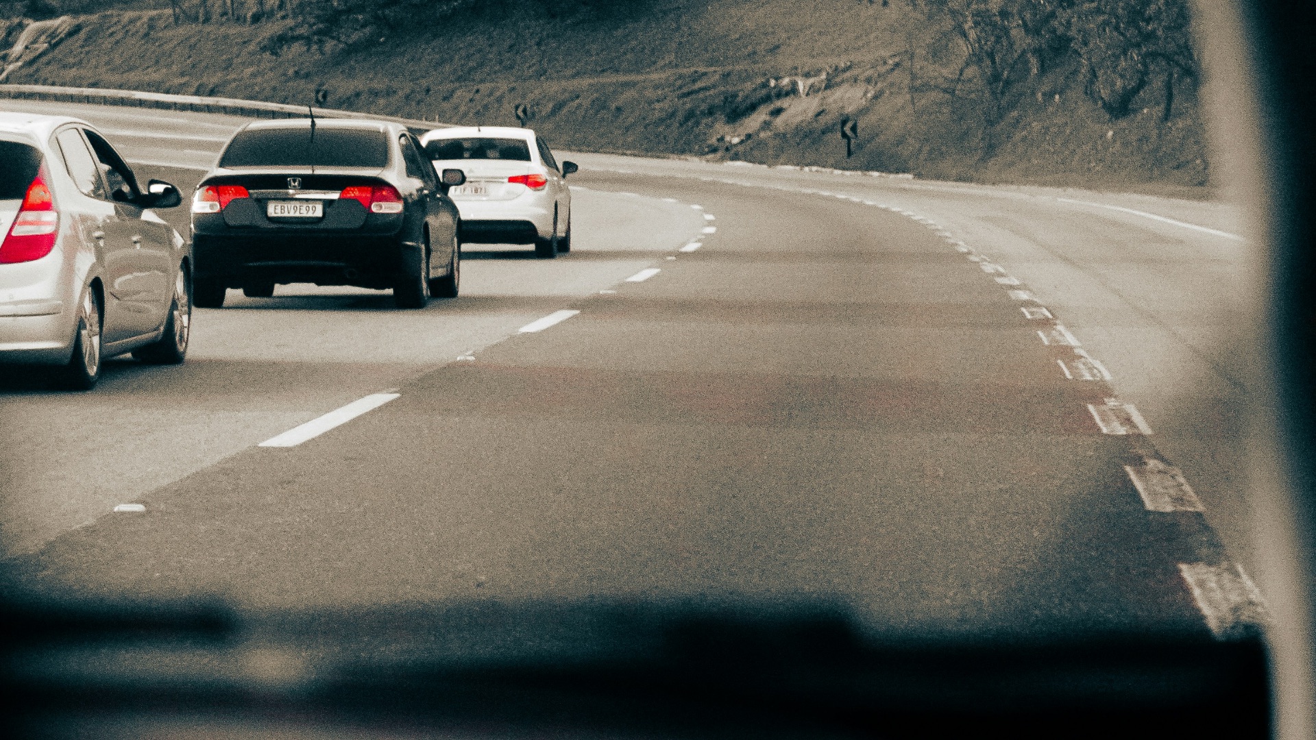 a group of cars on a road