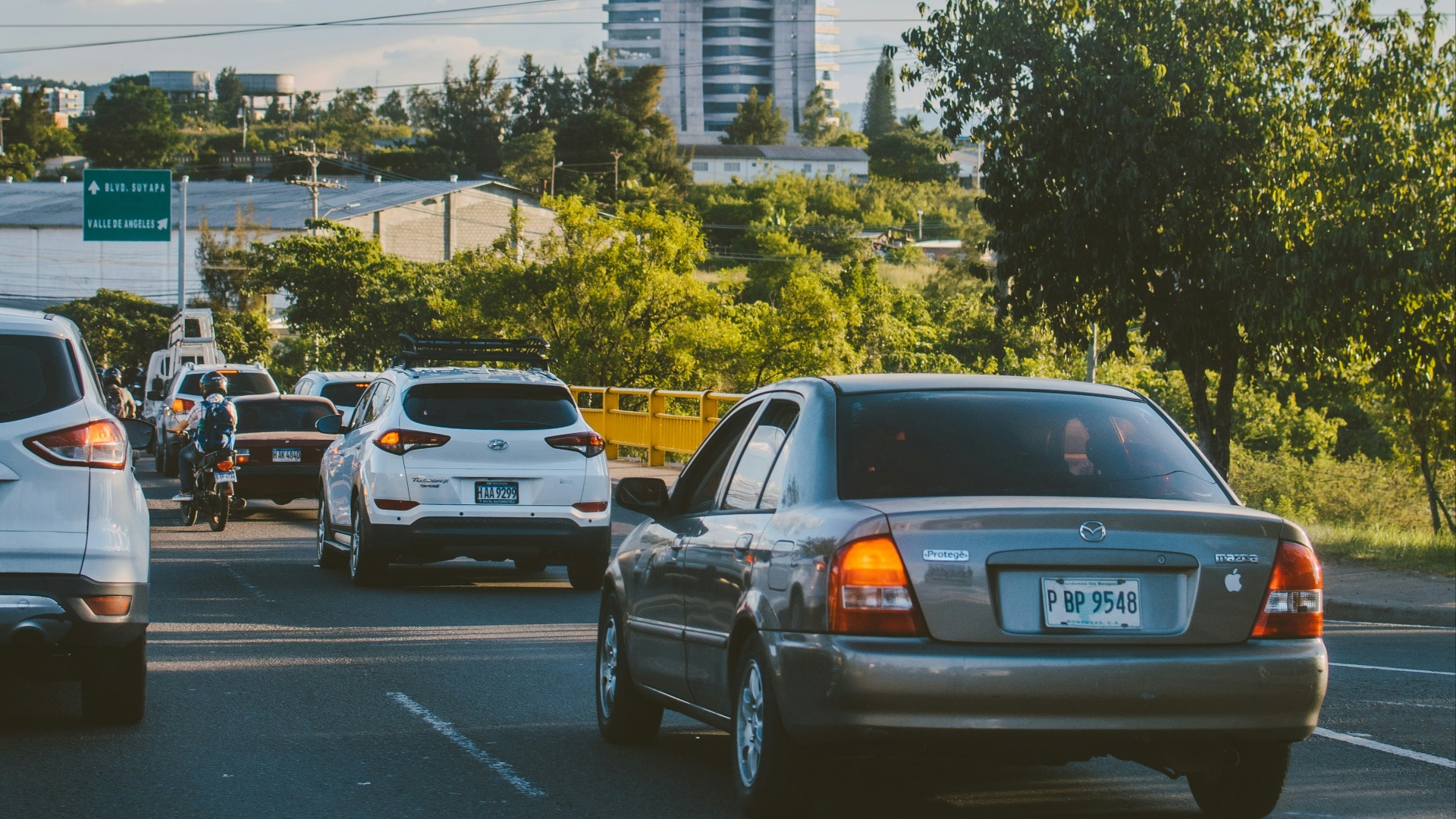 a bunch of cars that are sitting in the street