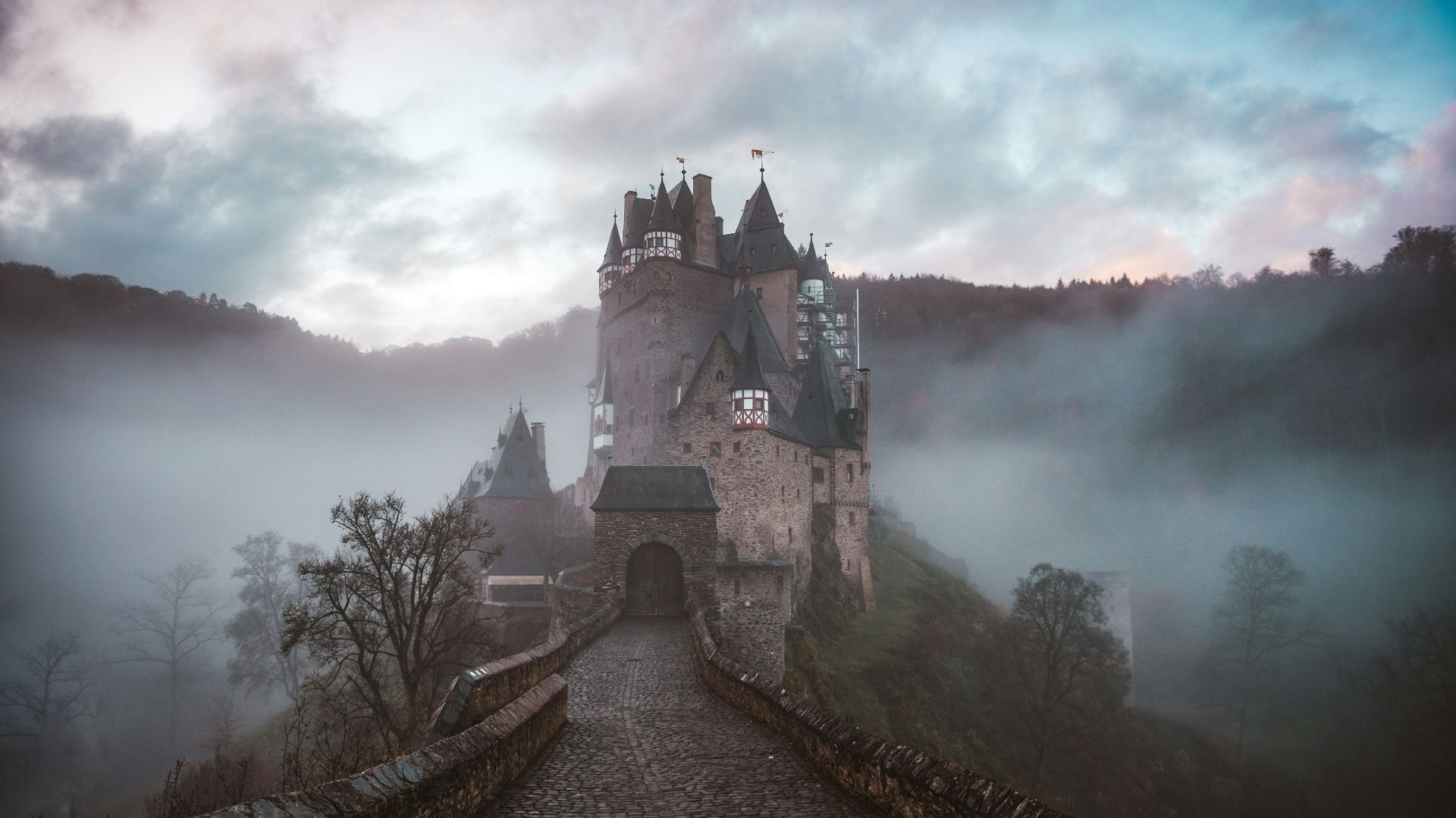 closeup photo of castle with mist