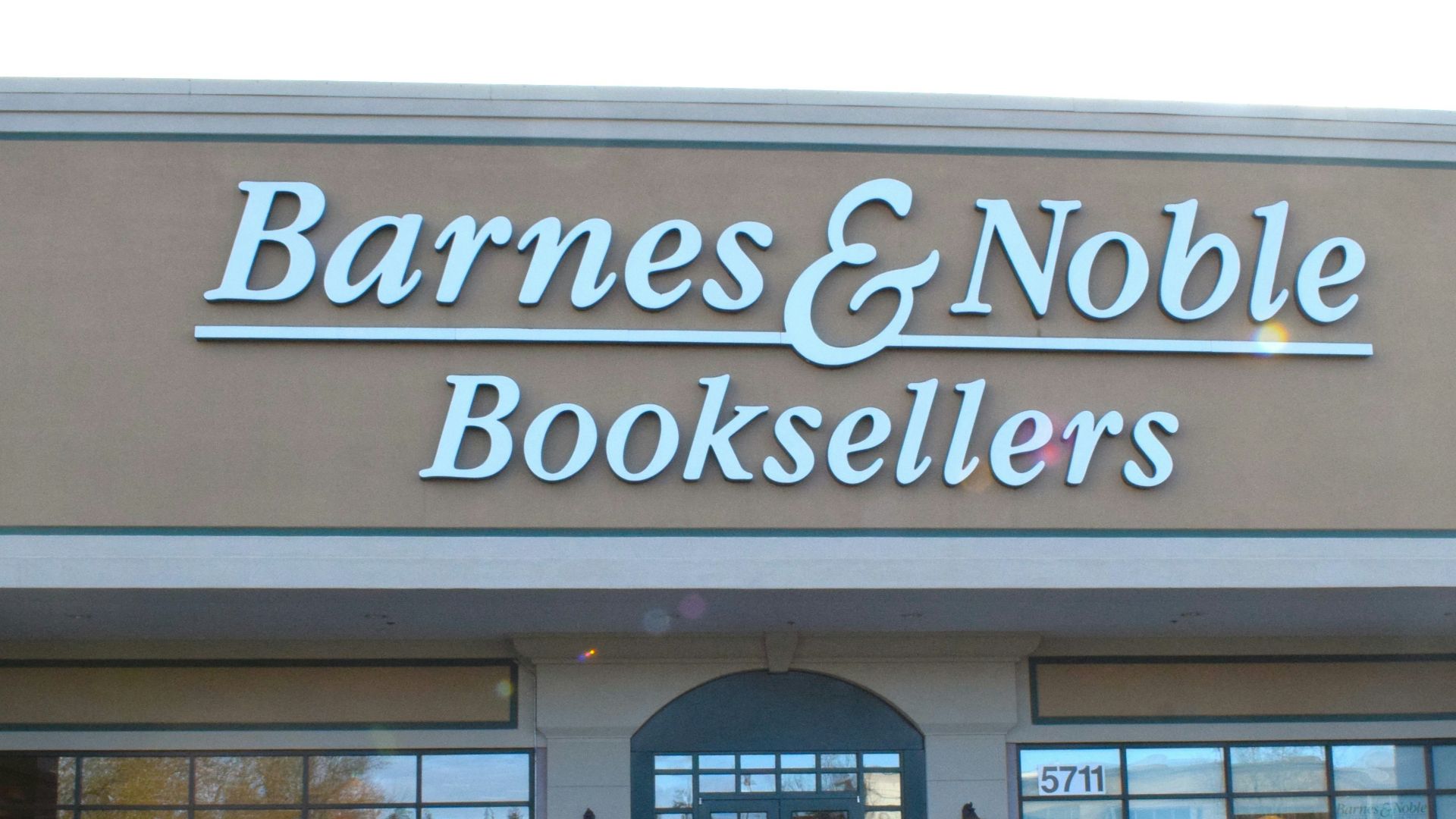 a car parked in front of a book store