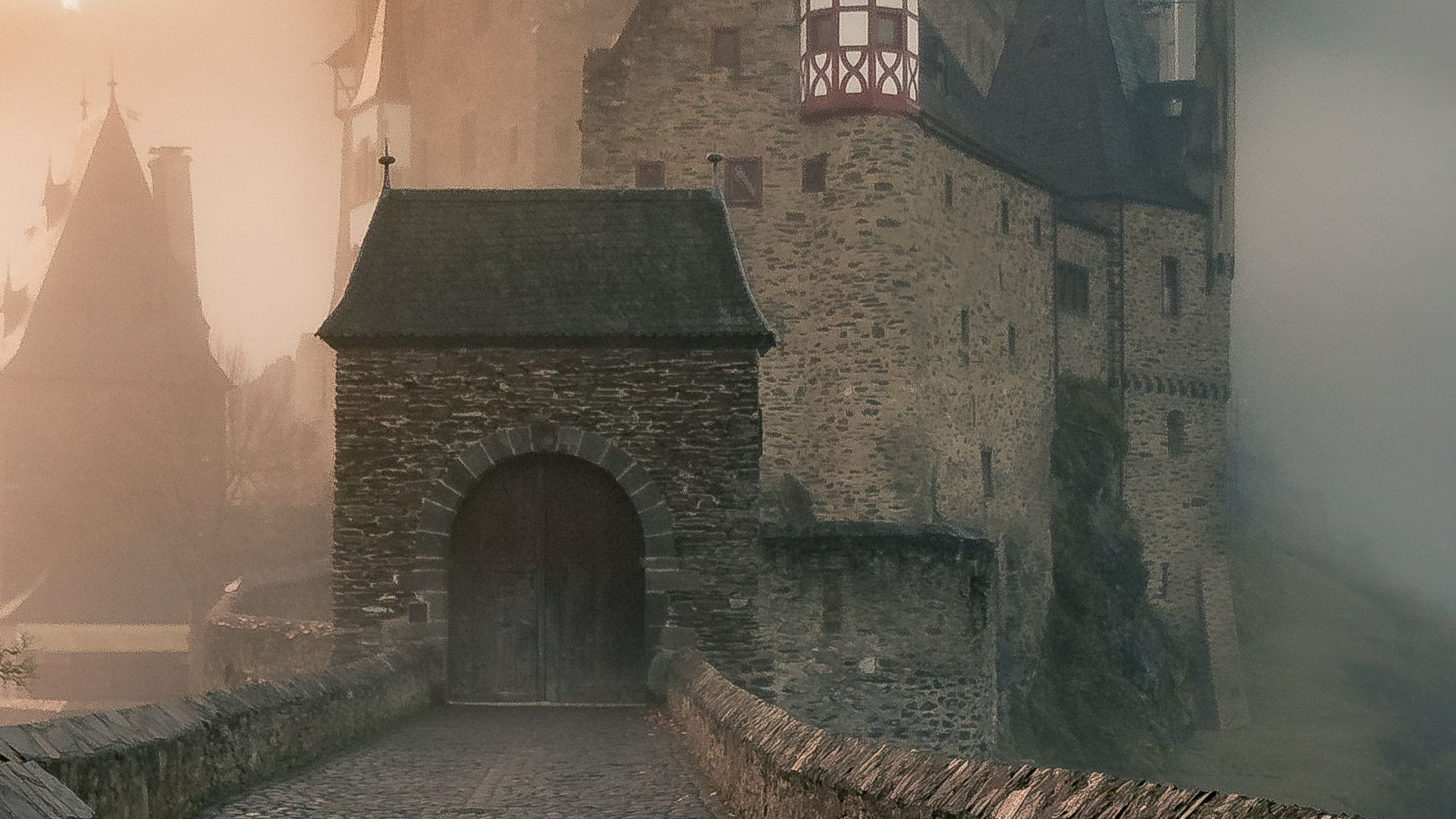 reflection of a castle surrounded with fogs