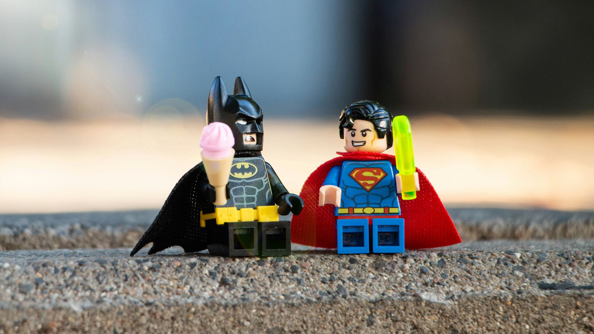 lego mini figure on brown sand