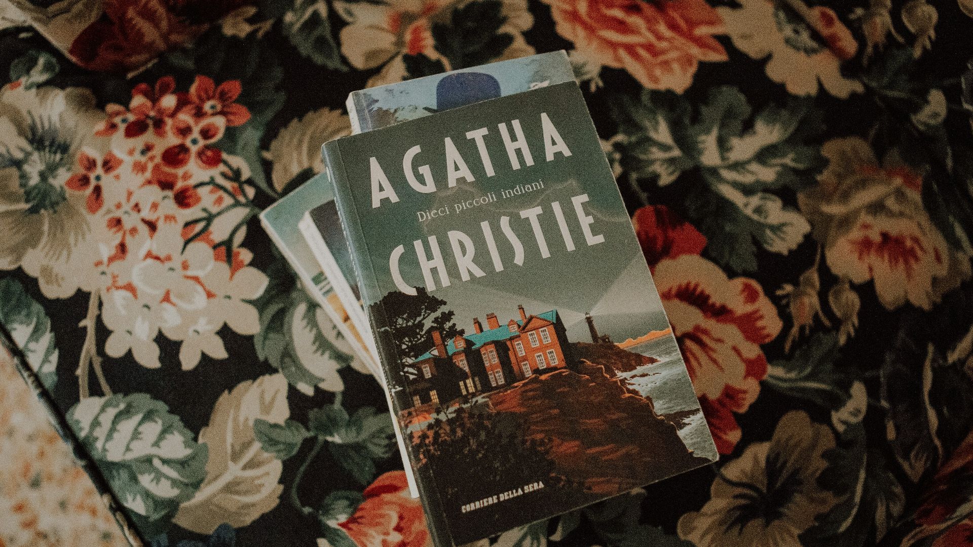 a book on a floral surface