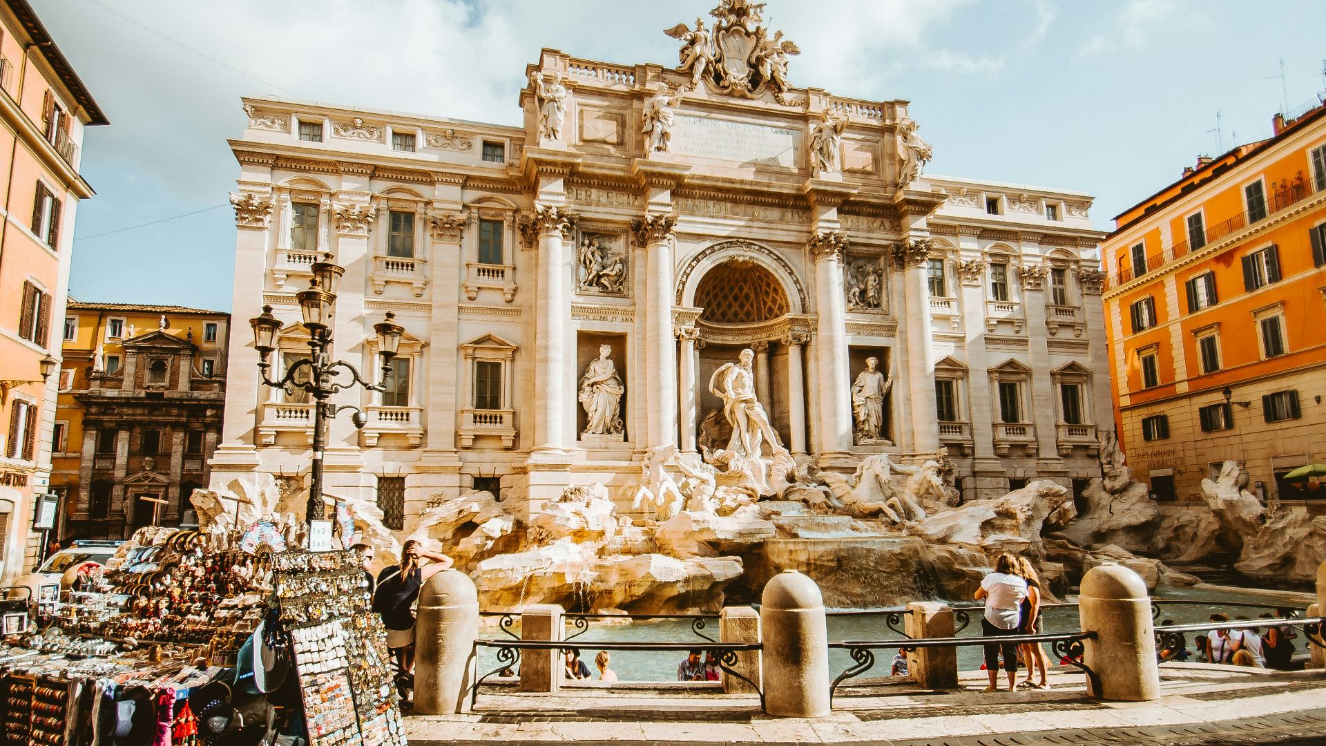man standing in front of statue