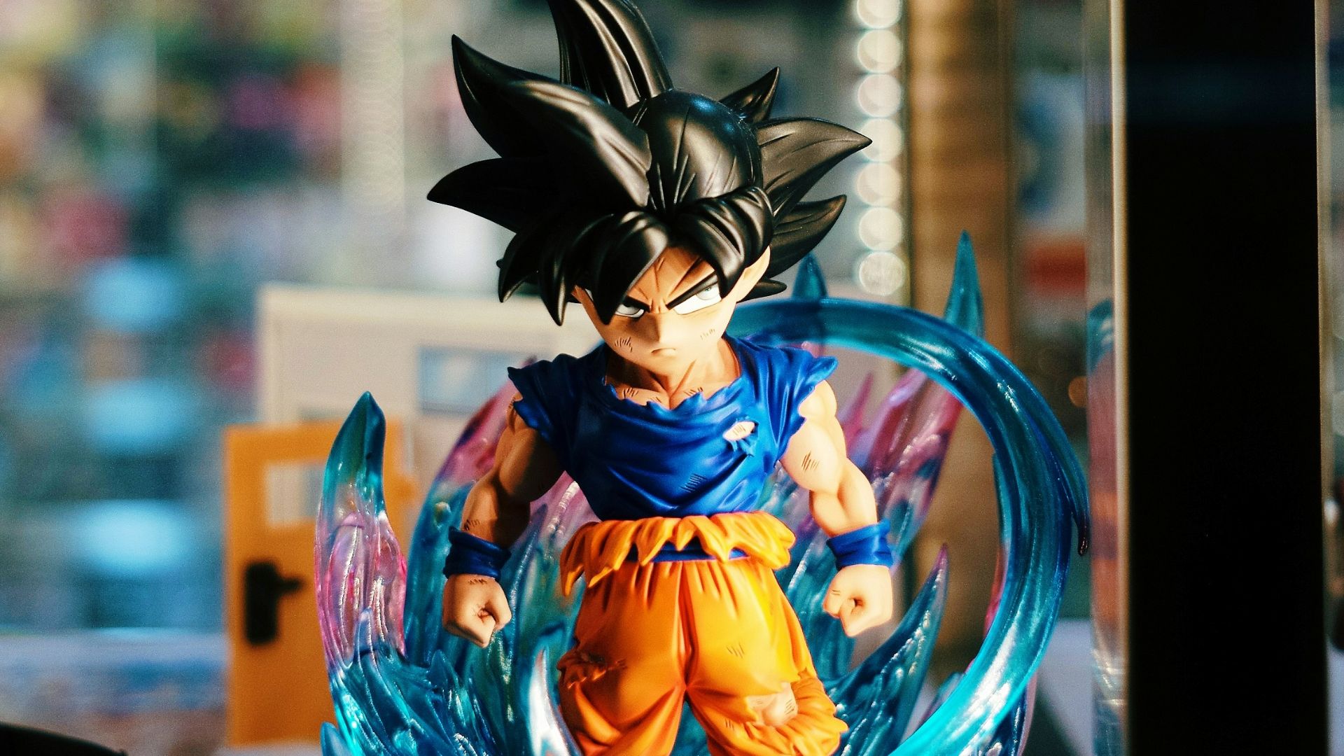 a dragon figurine sitting on top of a table