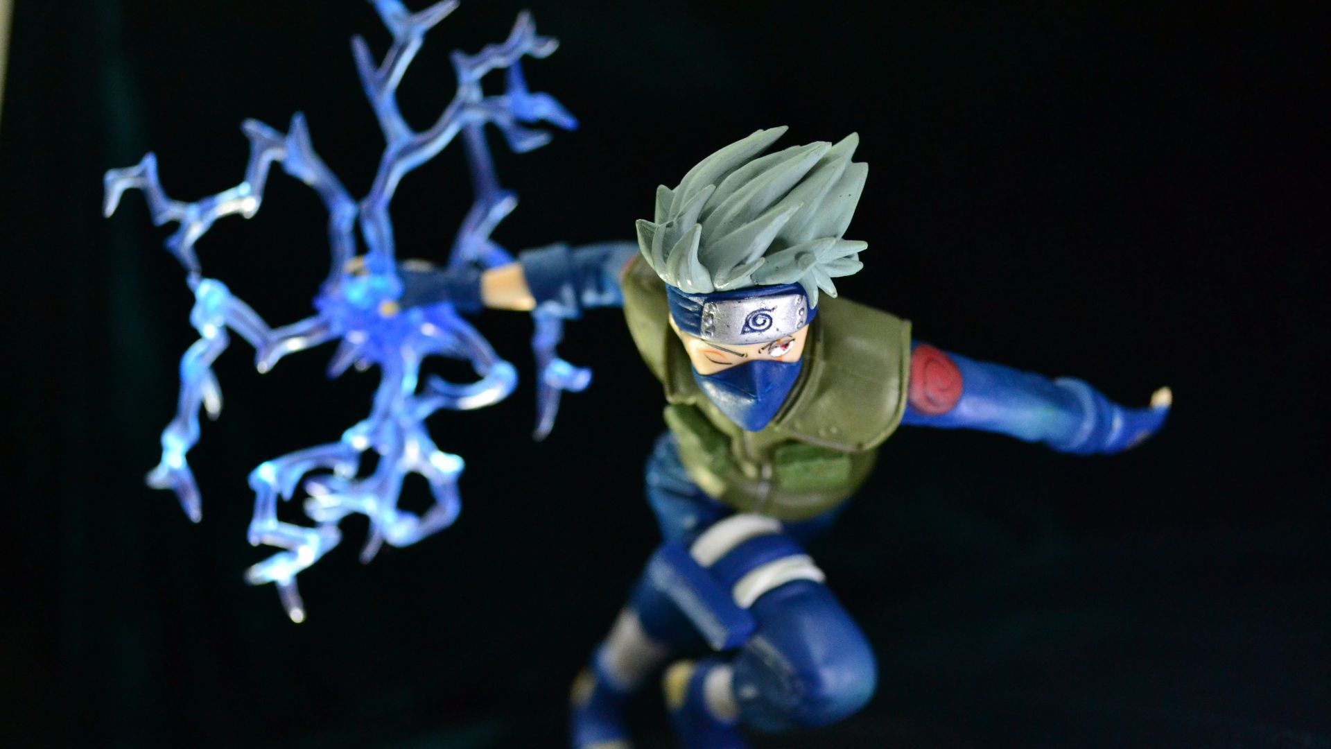 blue and yellow robot action figure