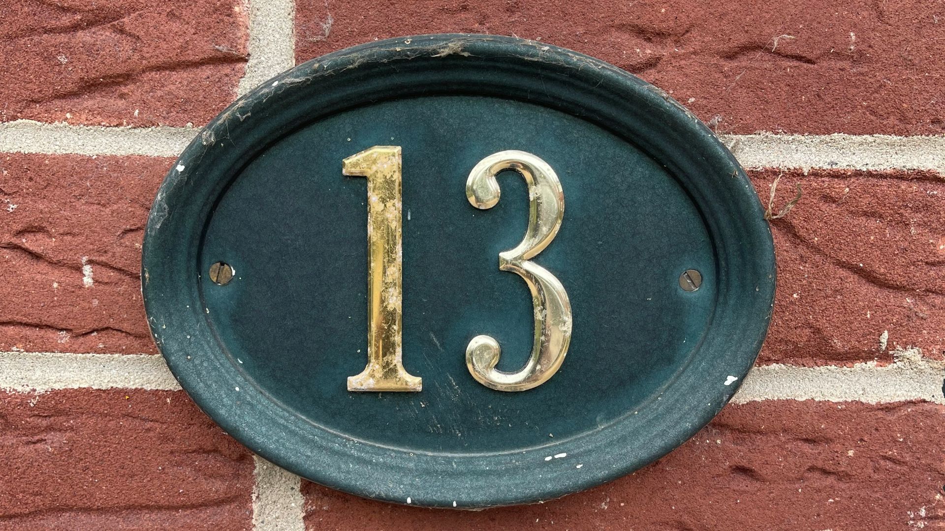 a blue square with gold text on it